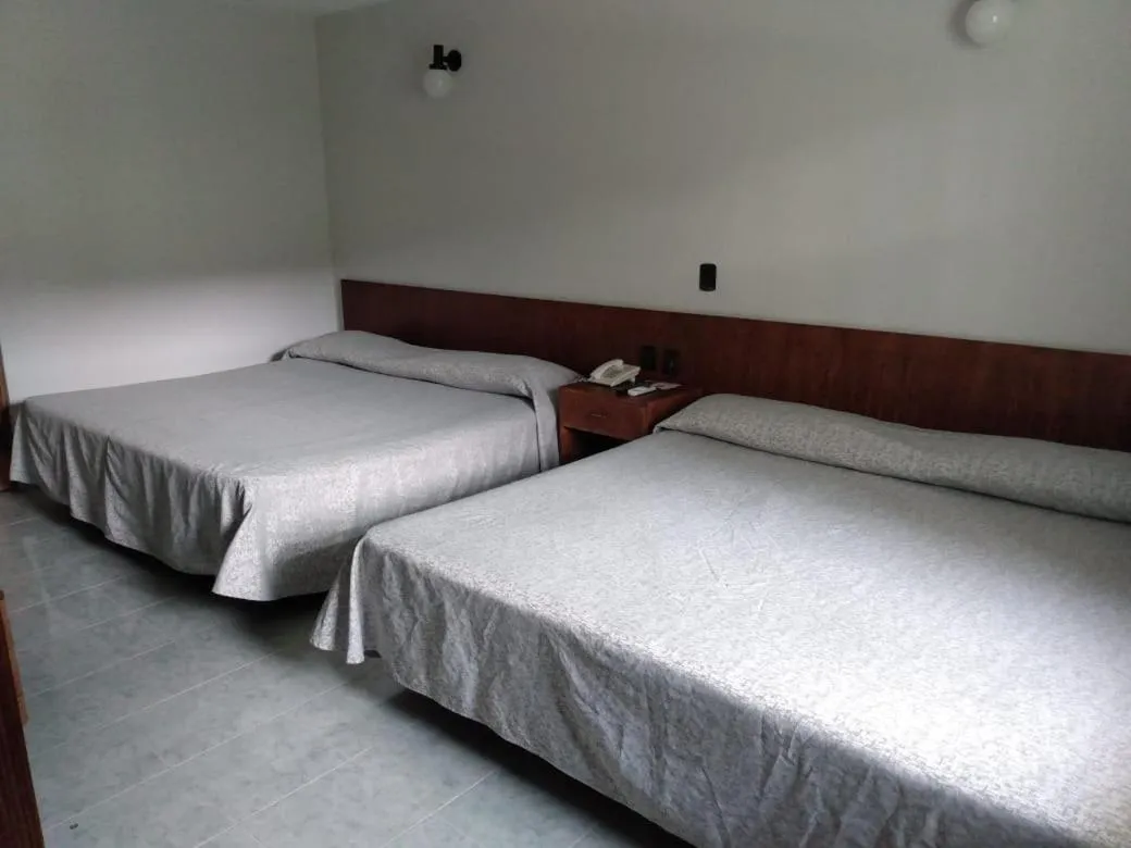 Bed in Dorados Conventions & Resort