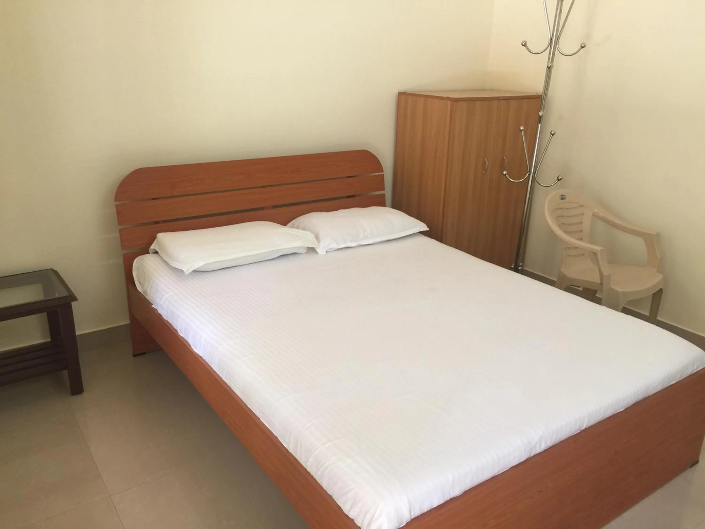 Bed in Palm Grove Service Villa
