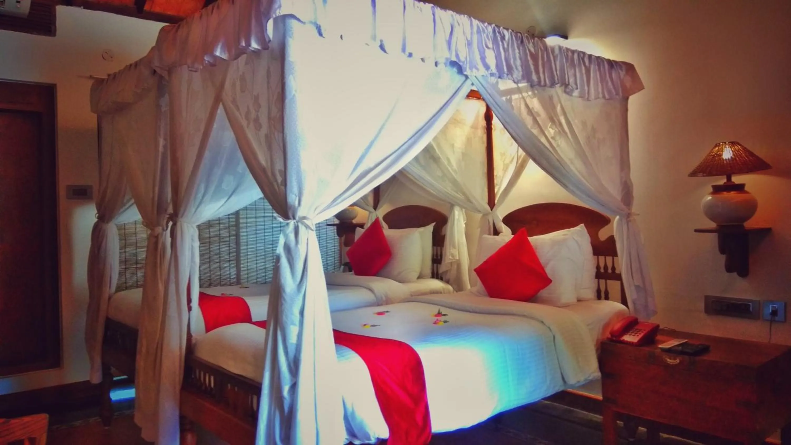 Bed in Punnamada Resort