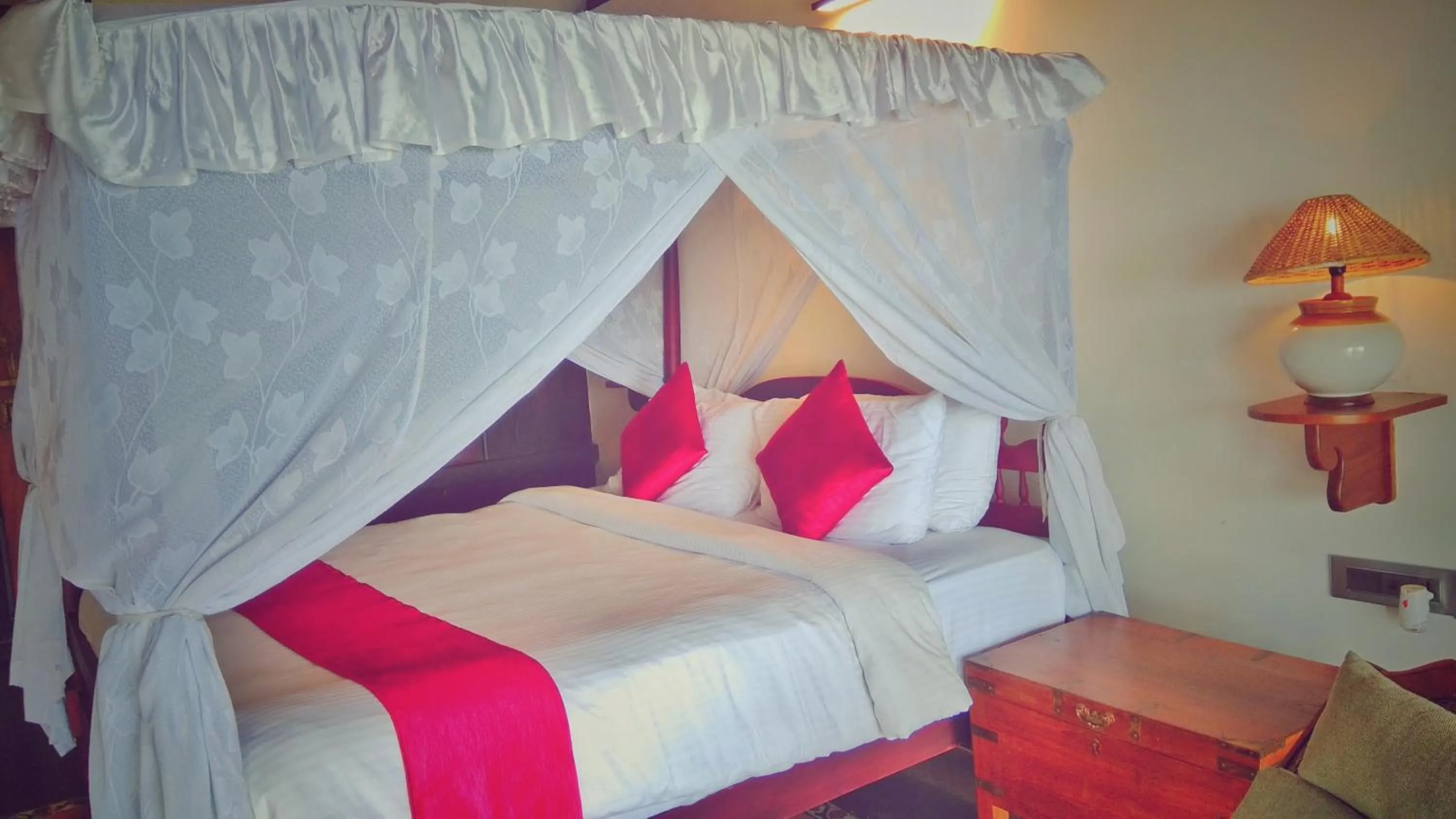 Bed in Punnamada Resort