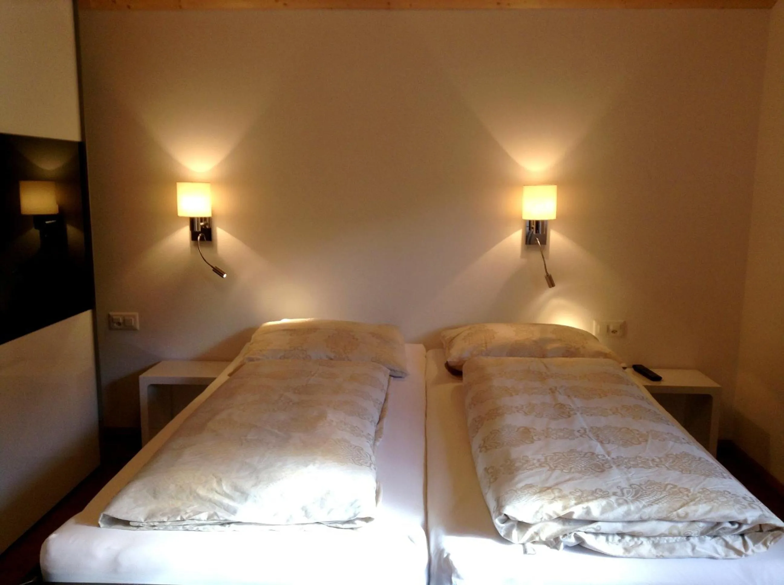 Bed in Chasa Sulai Appartements