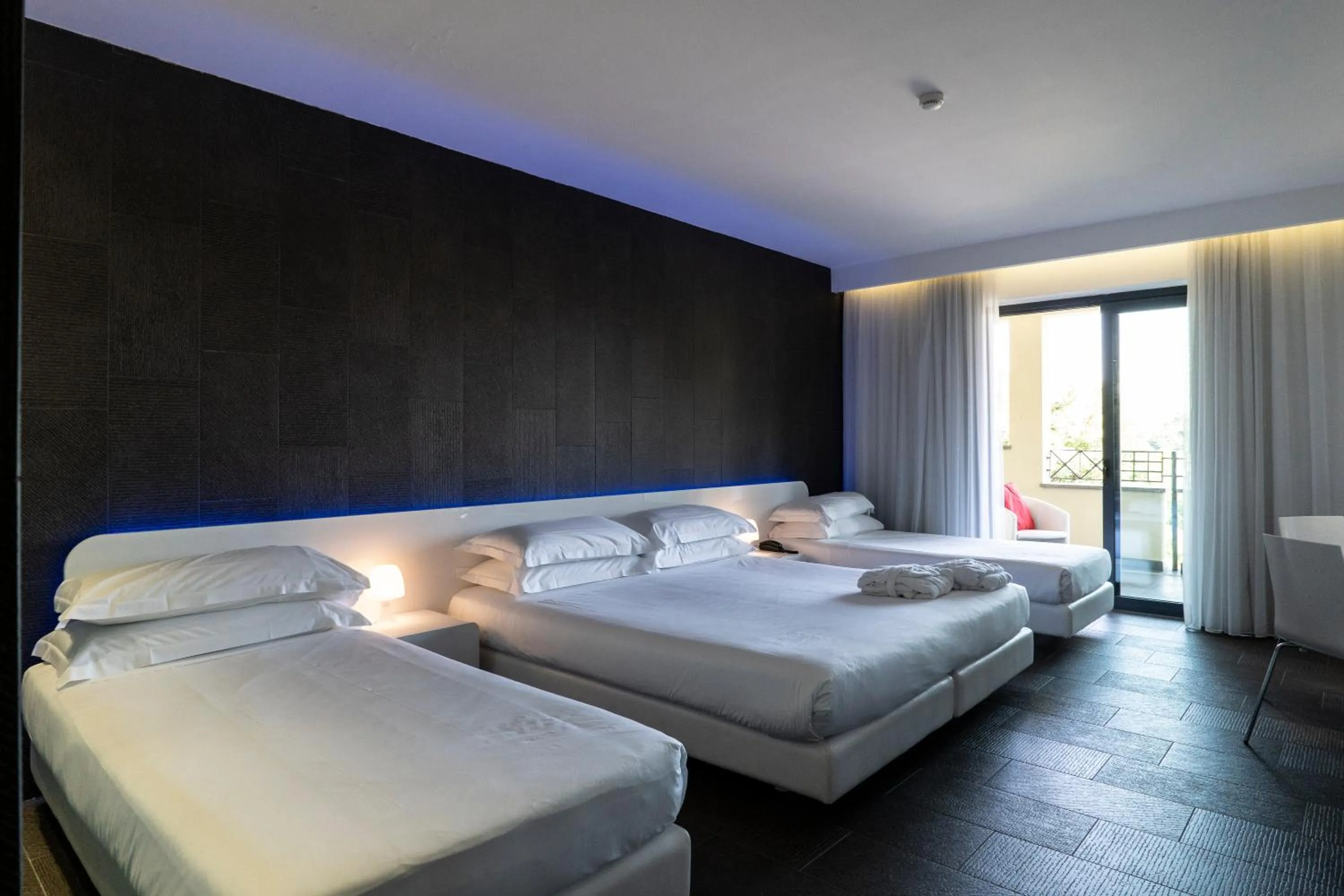 Bed in A Point Porto Ercole Resort & Spa