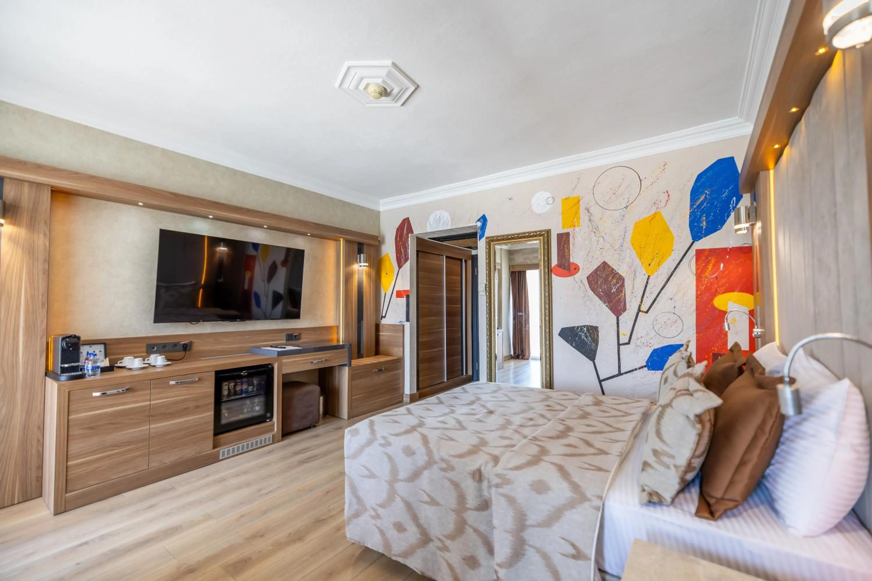 Bed in LAUR HOTELS Experience & Elegance