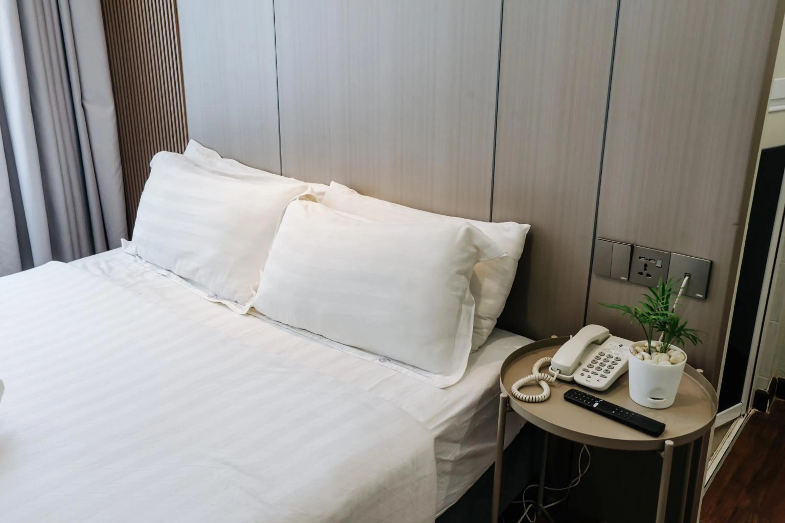 Bed in Wangs Hotel Gurney Drive