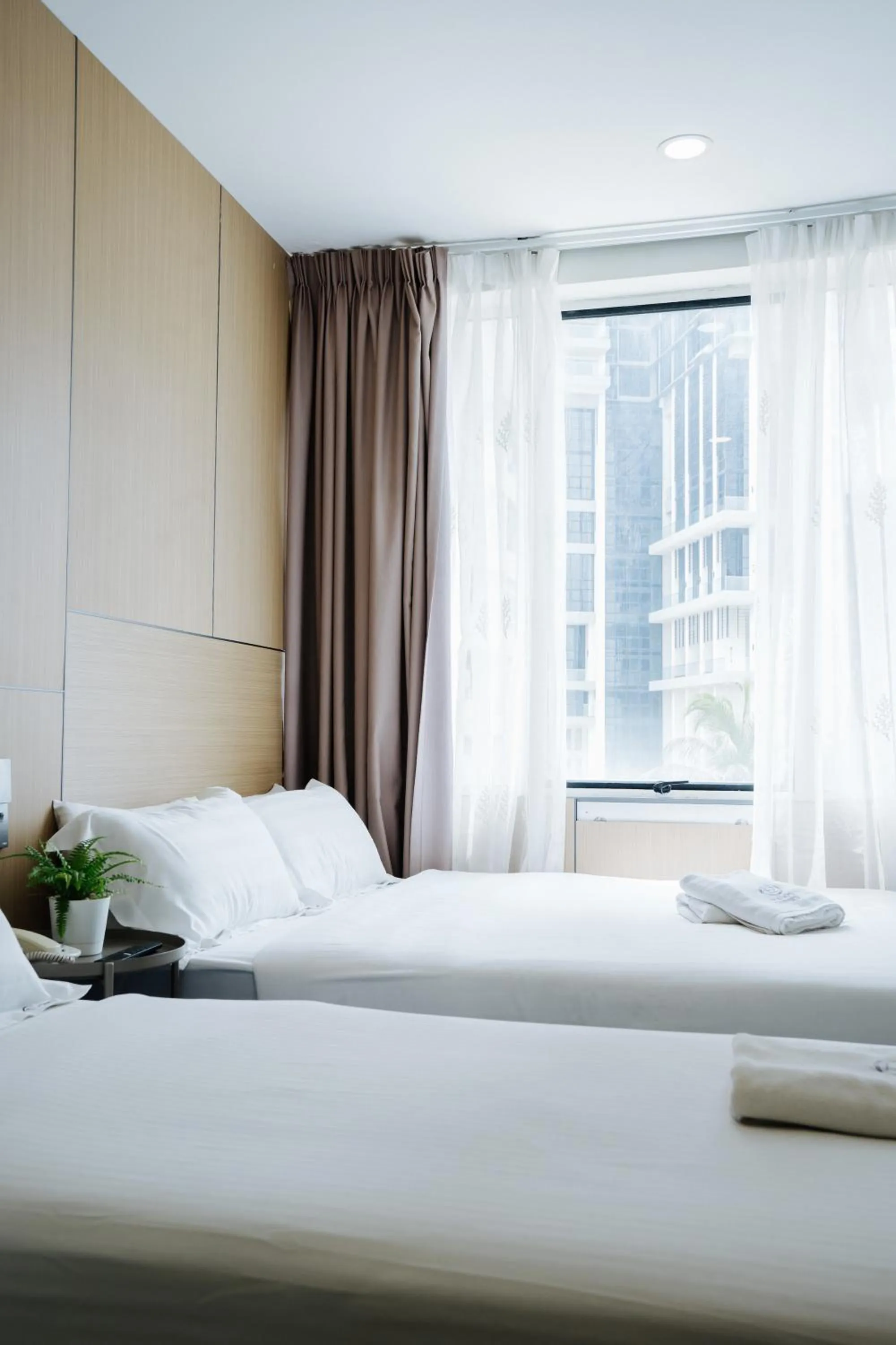 Bed in Wangs Hotel Gurney Drive