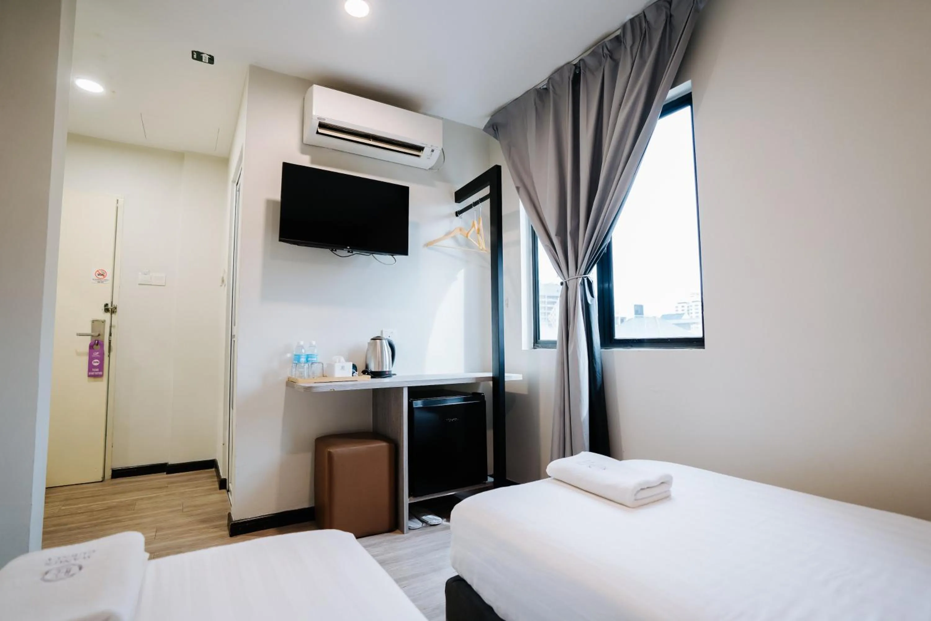 Bed in Wangs Hotel Gurney Drive