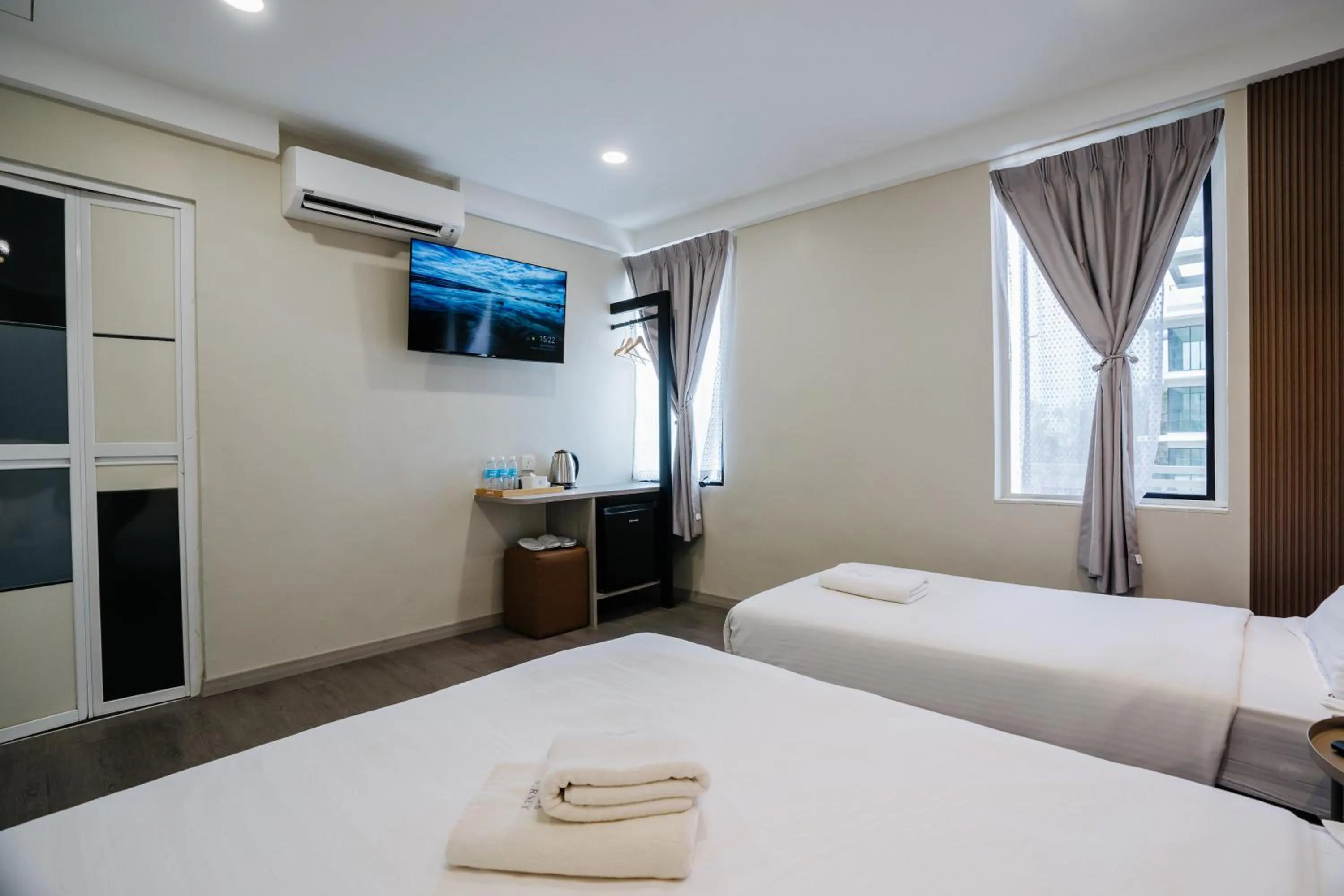 Bed in Wangs Hotel Gurney Drive