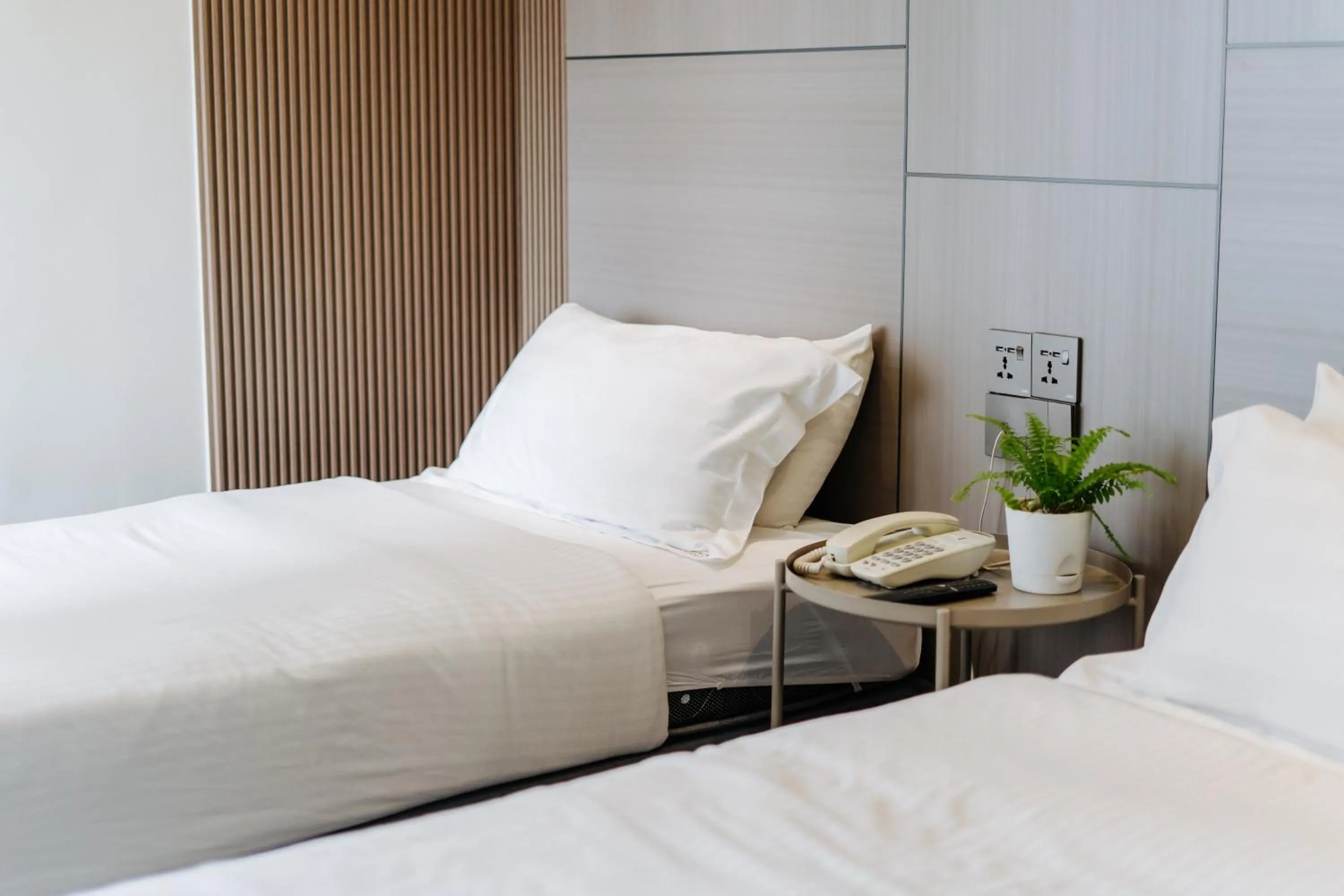 Bed in Wangs Hotel Gurney Drive