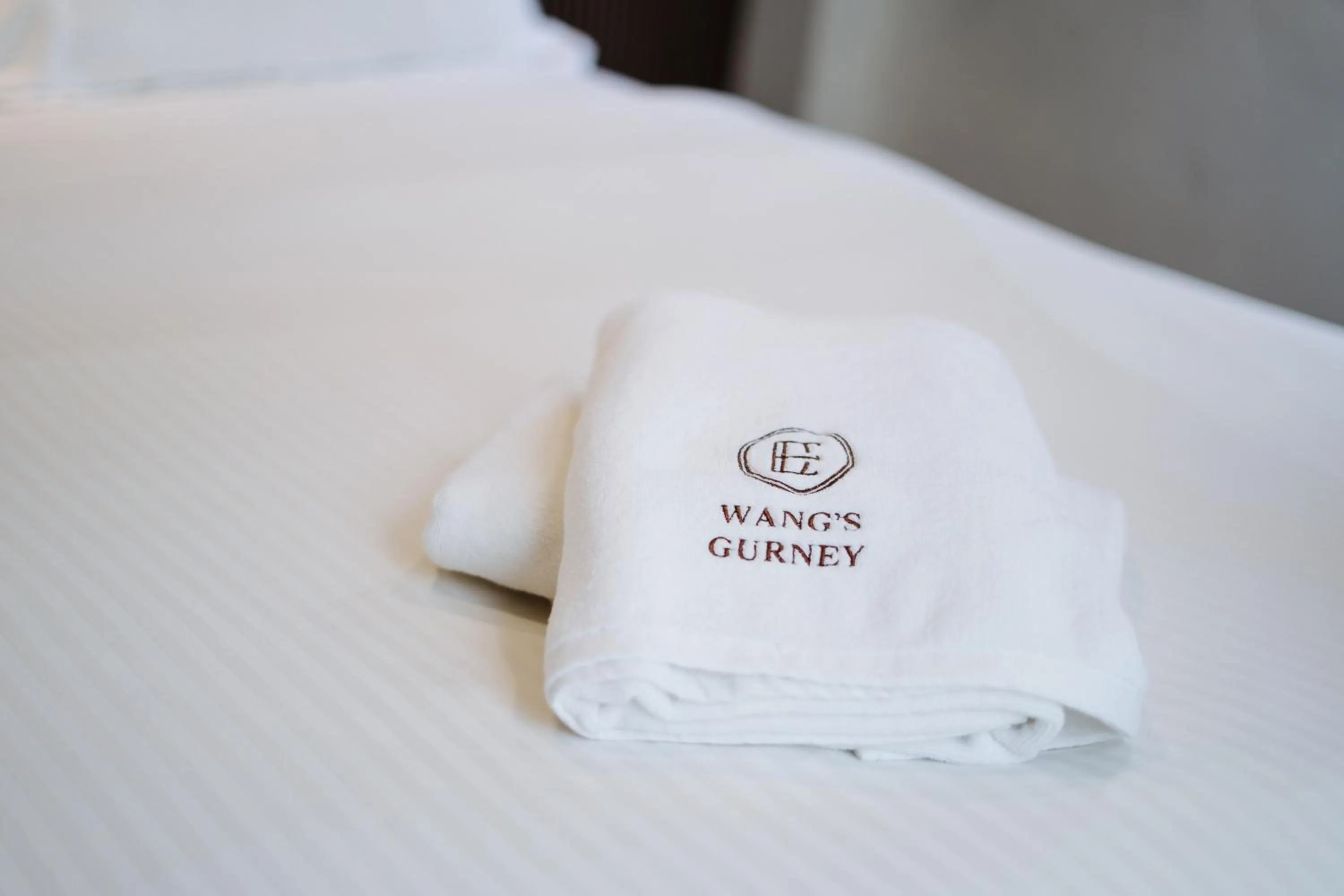 Property logo or sign, Bed in Wangs Hotel Gurney Drive