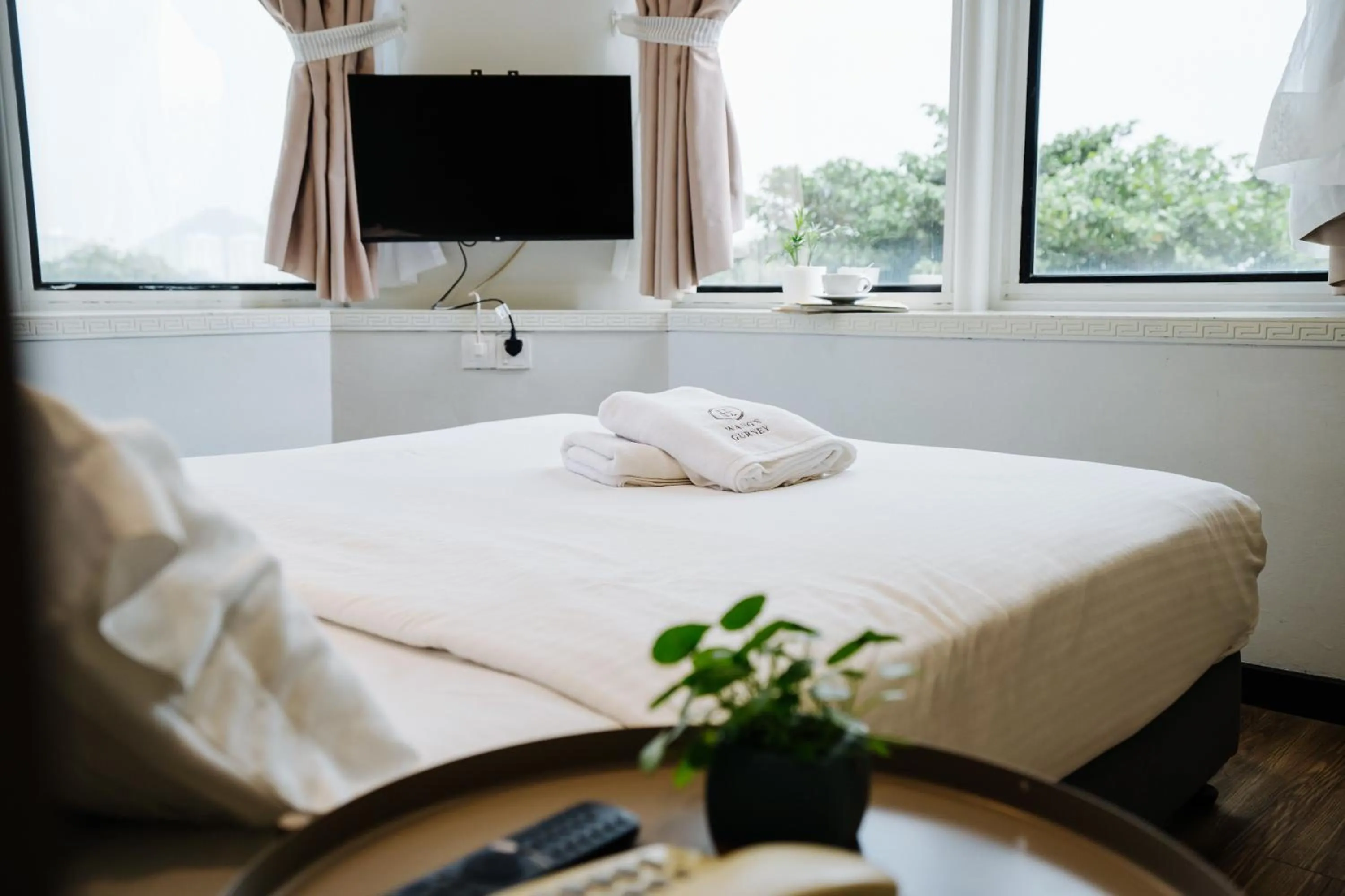 Bed in Wangs Hotel Gurney Drive