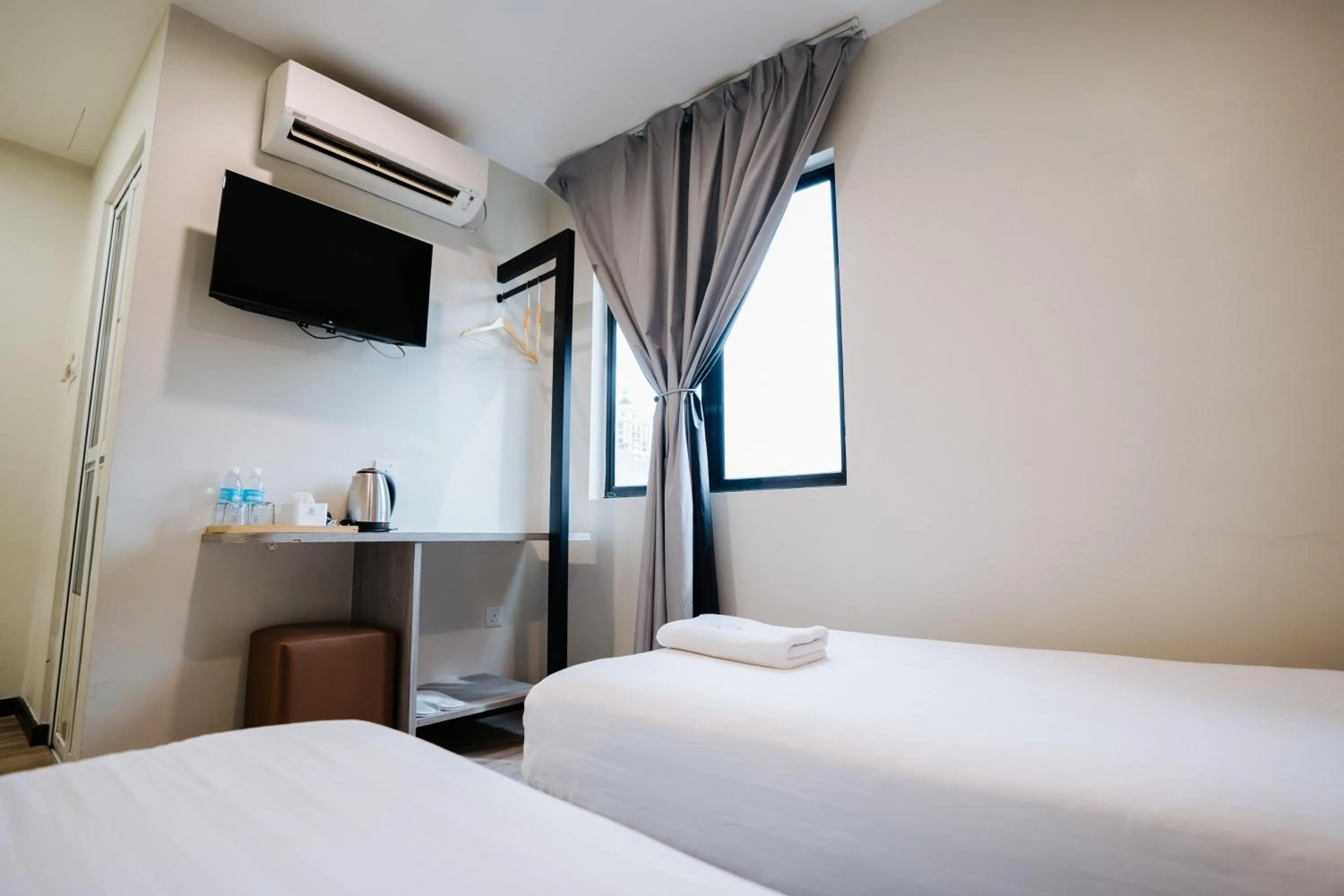 Bed in Wangs Hotel Gurney Drive