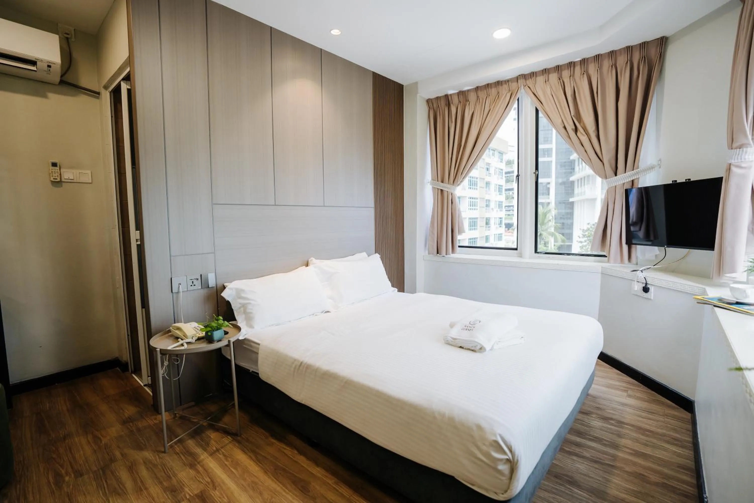 Bed in Wangs Hotel Gurney Drive