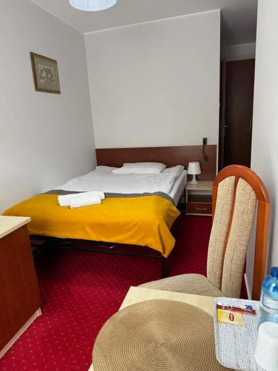 Bed in Hotel Aleksander