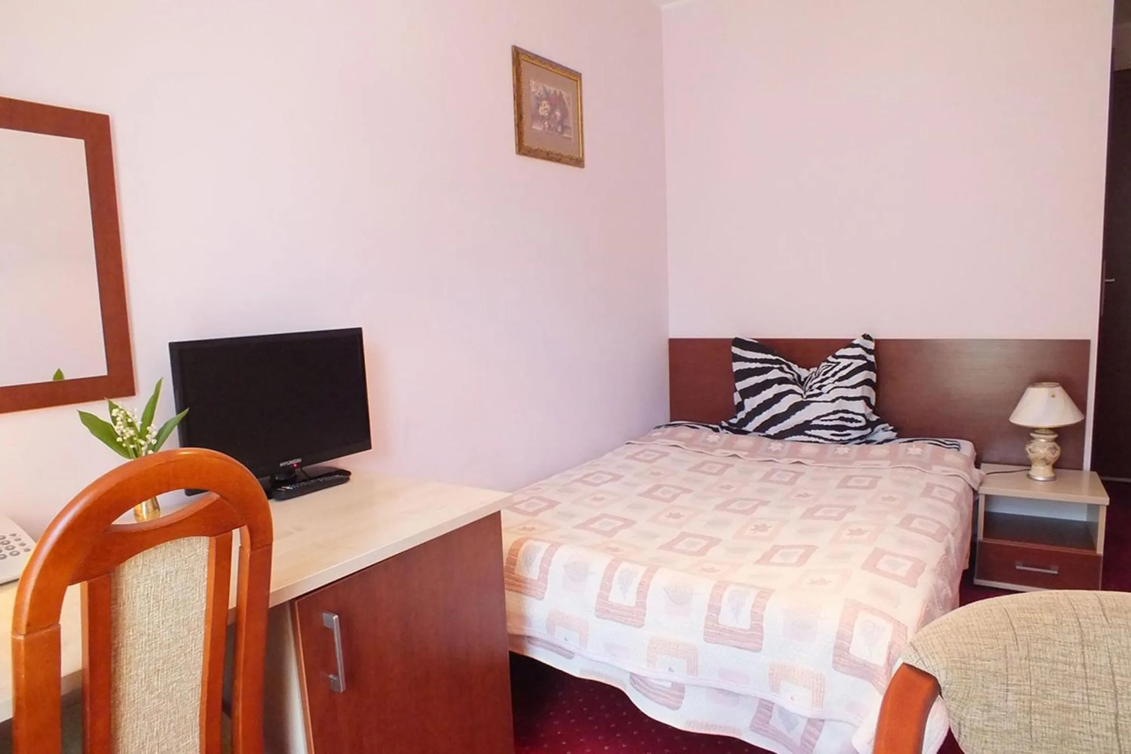 Bed in Hotel Aleksander