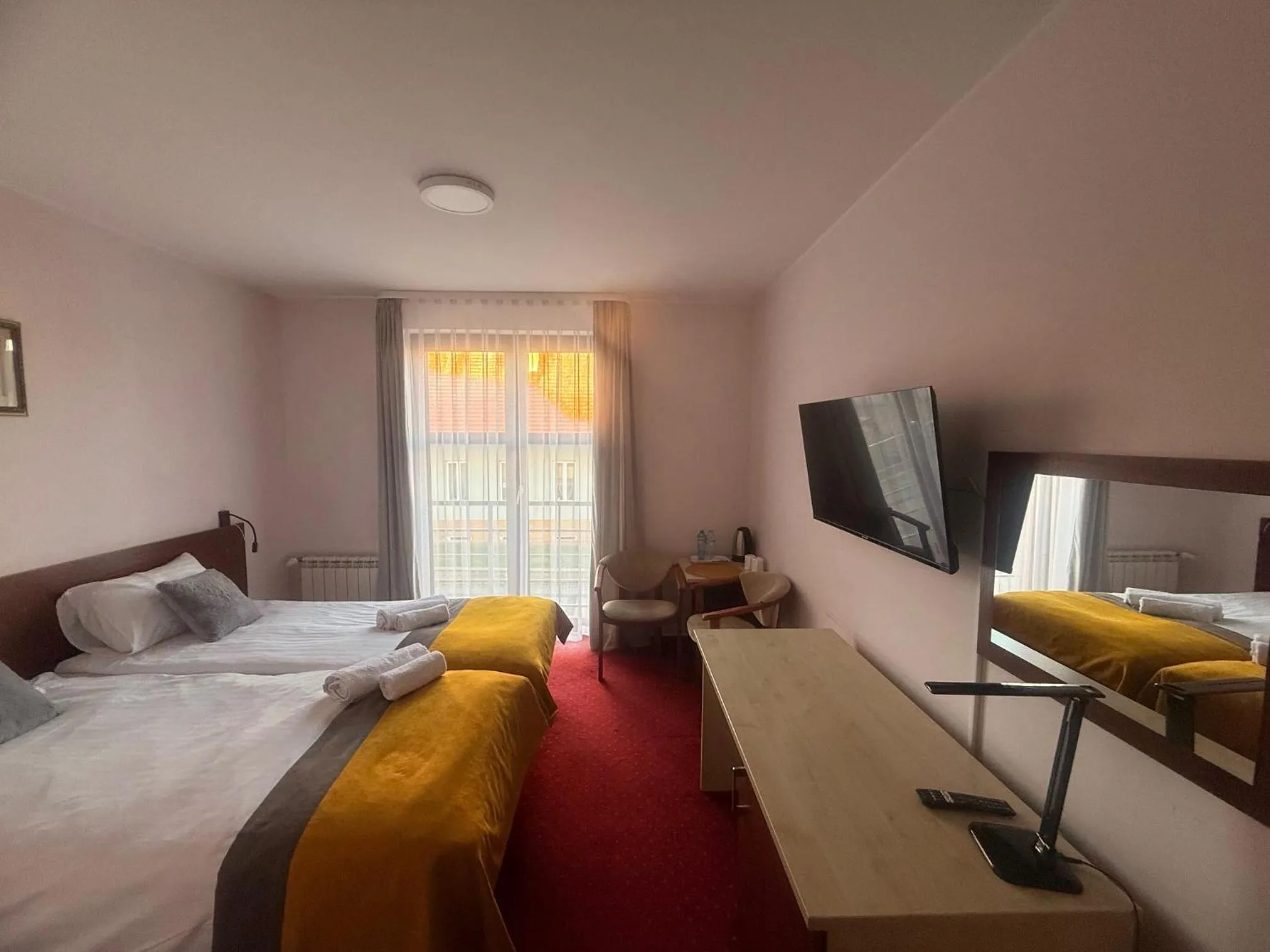 Bed in Hotel Aleksander