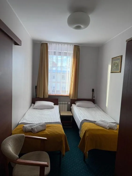 Bed in Hotel Aleksander