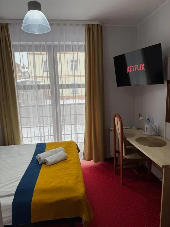 Bed in Hotel Aleksander