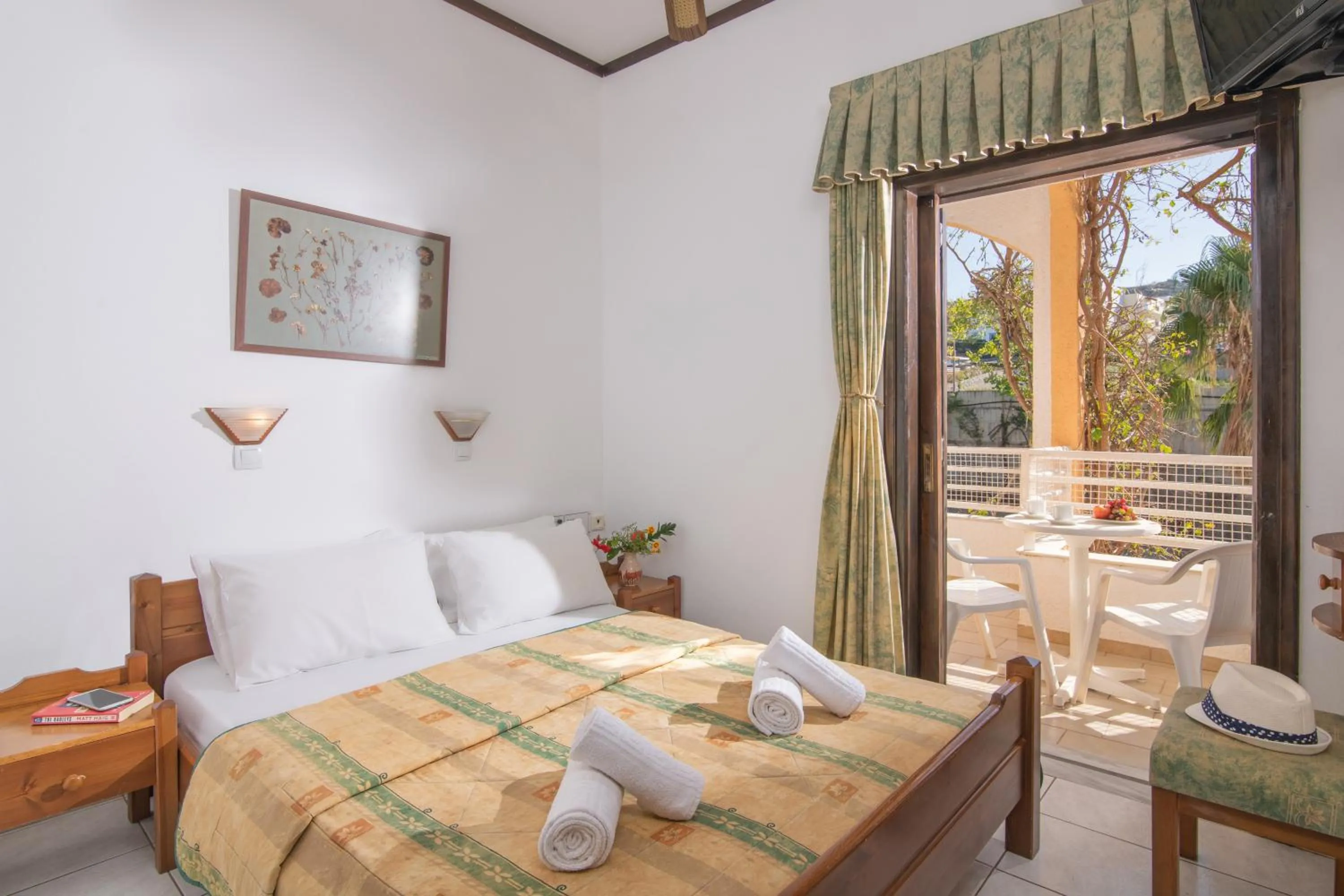 Bed in Iliostasi Beach Apartments