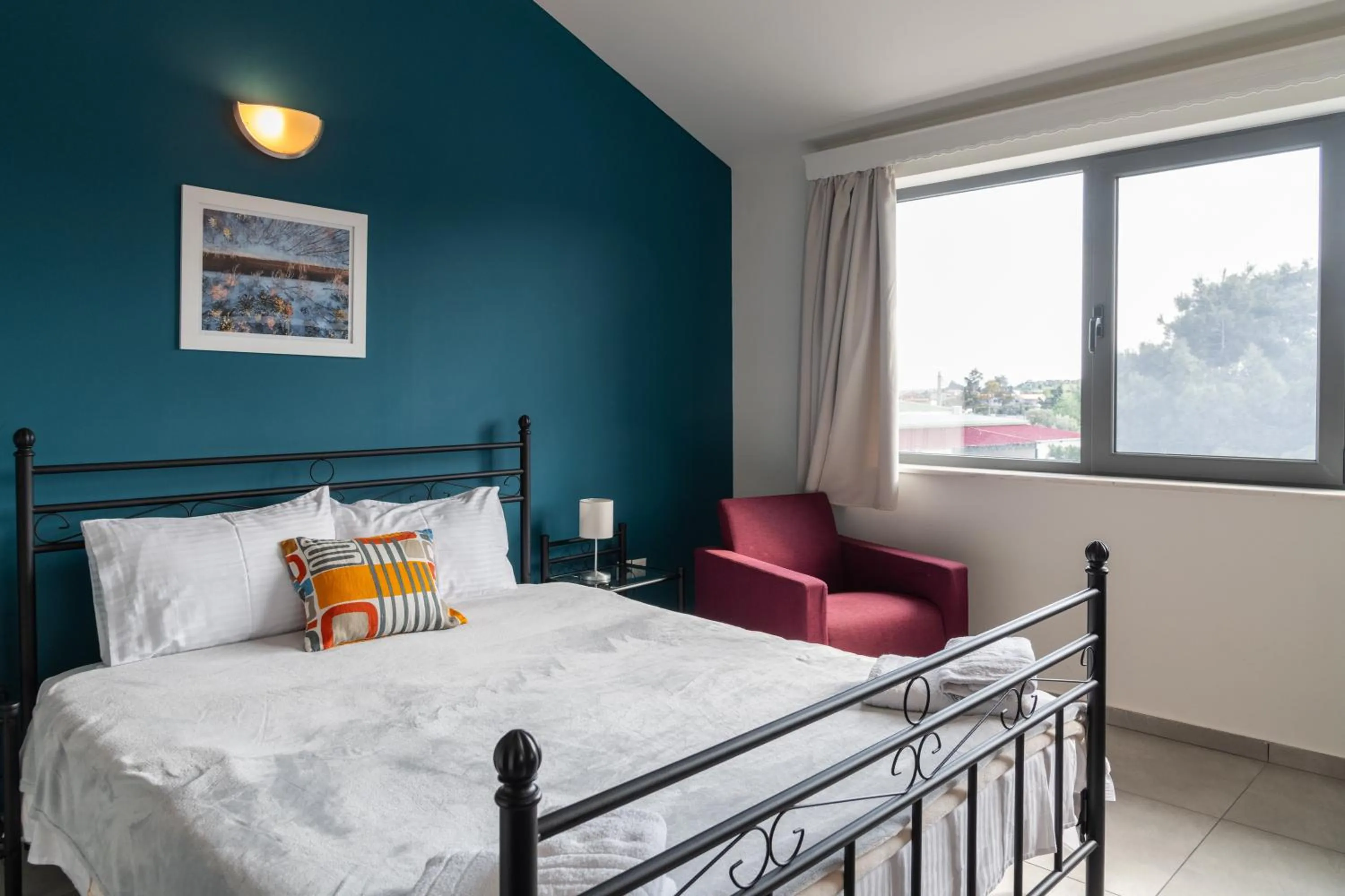 Bed in CHROMA Lodge Pikermi