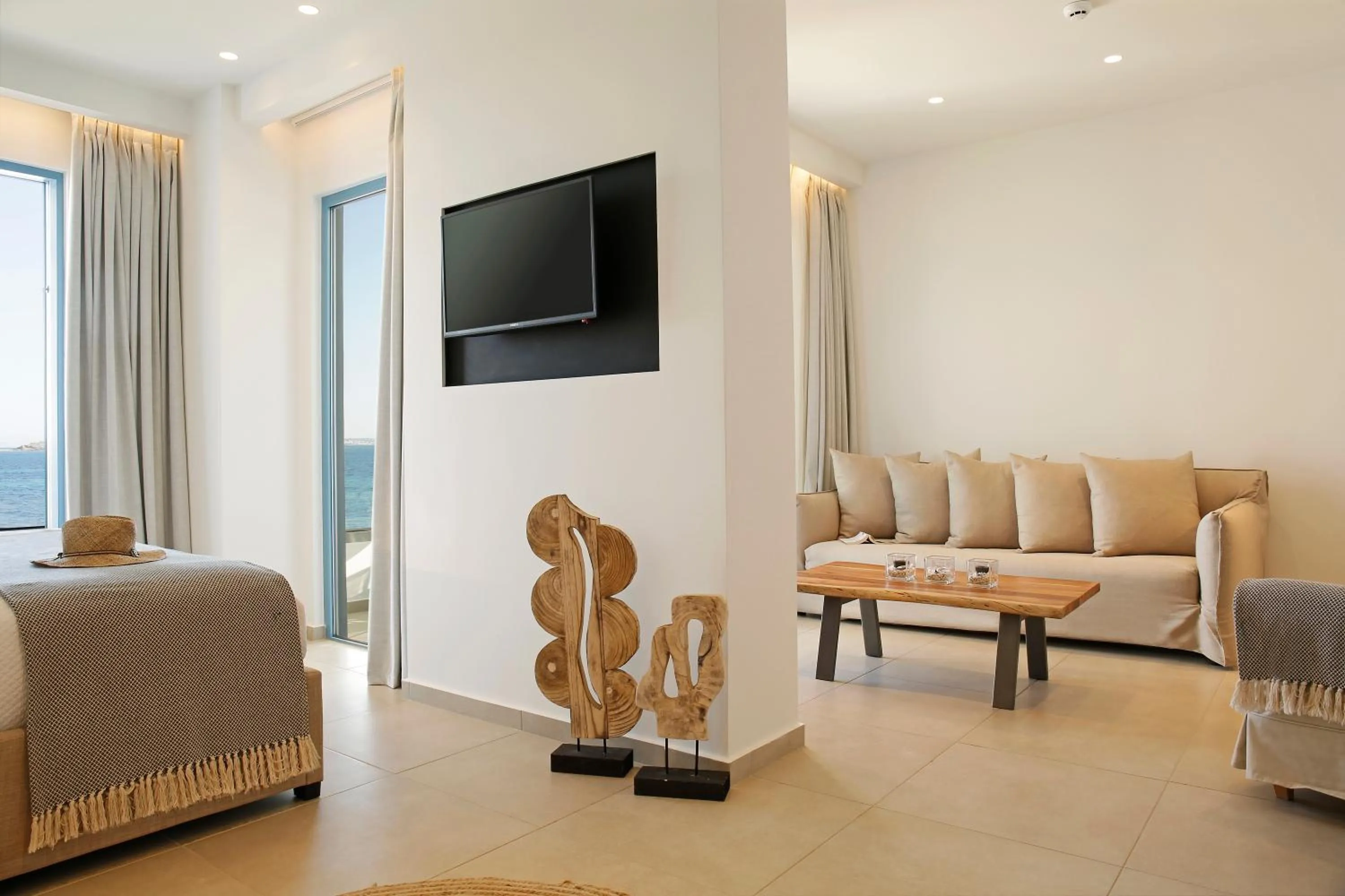 Bed in Oasis Beach Hotel