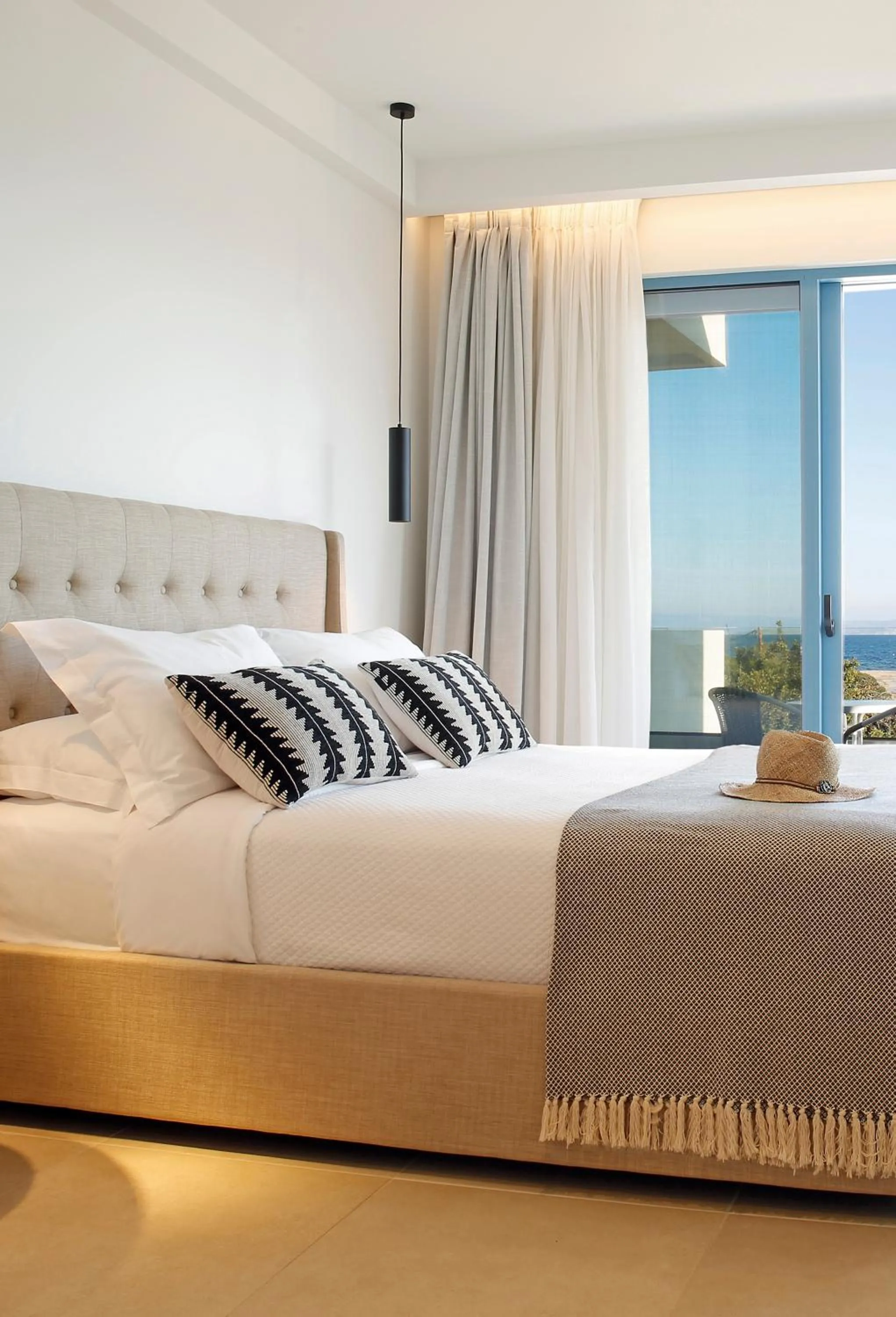 Bed in Oasis Beach Hotel