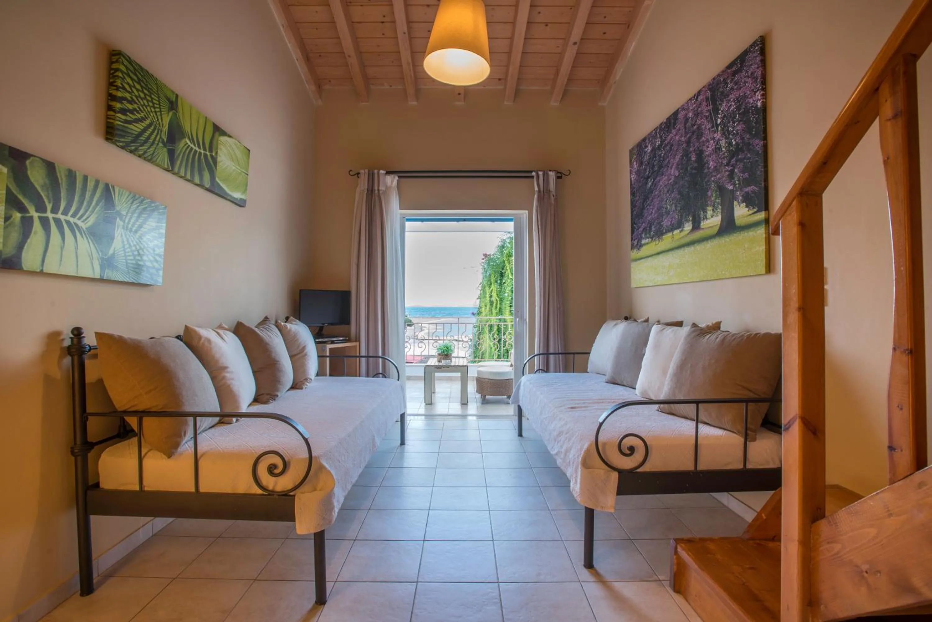 Bed in Oasis Beach Hotel