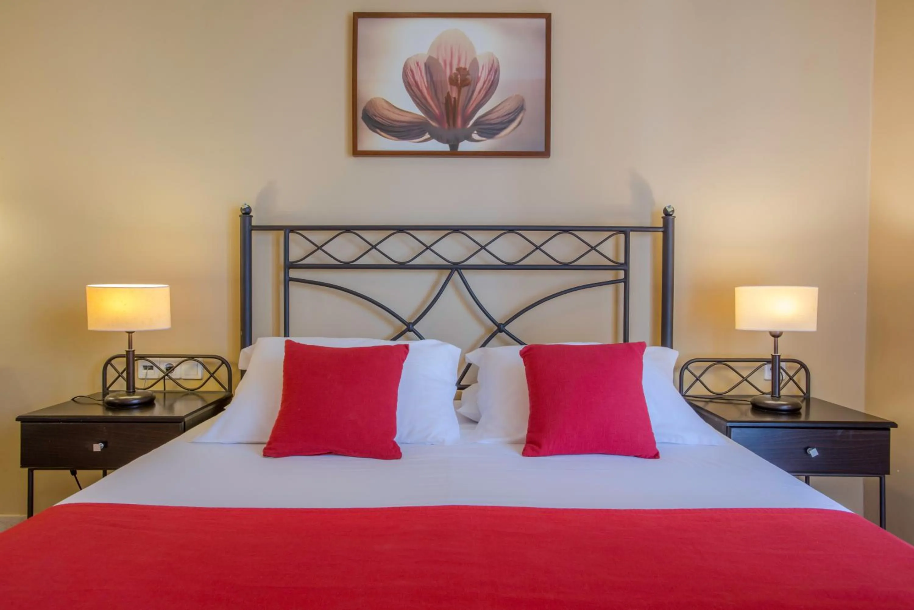 Bed in Oasis Beach Hotel