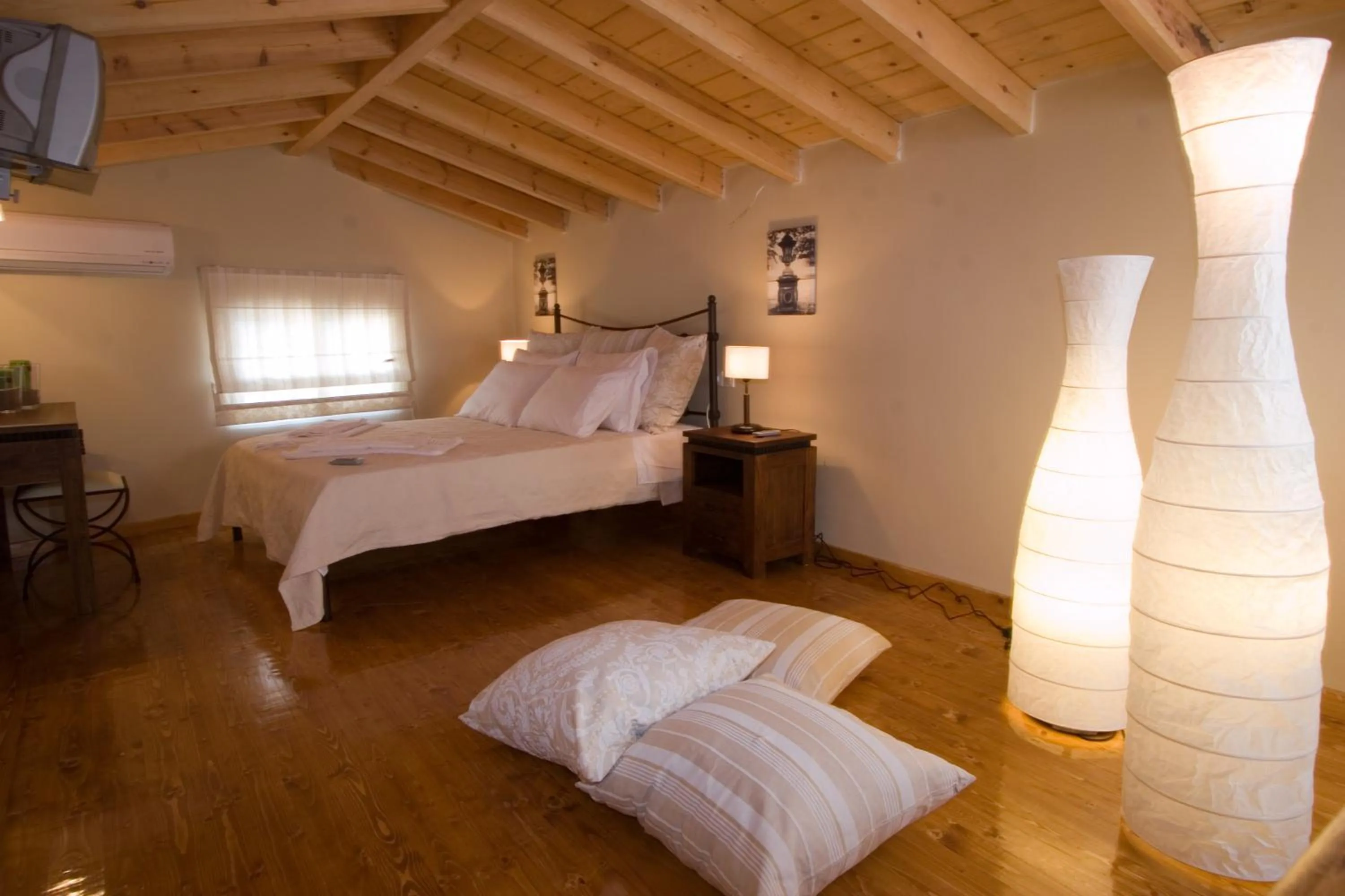 Bed in Oasis Beach Hotel