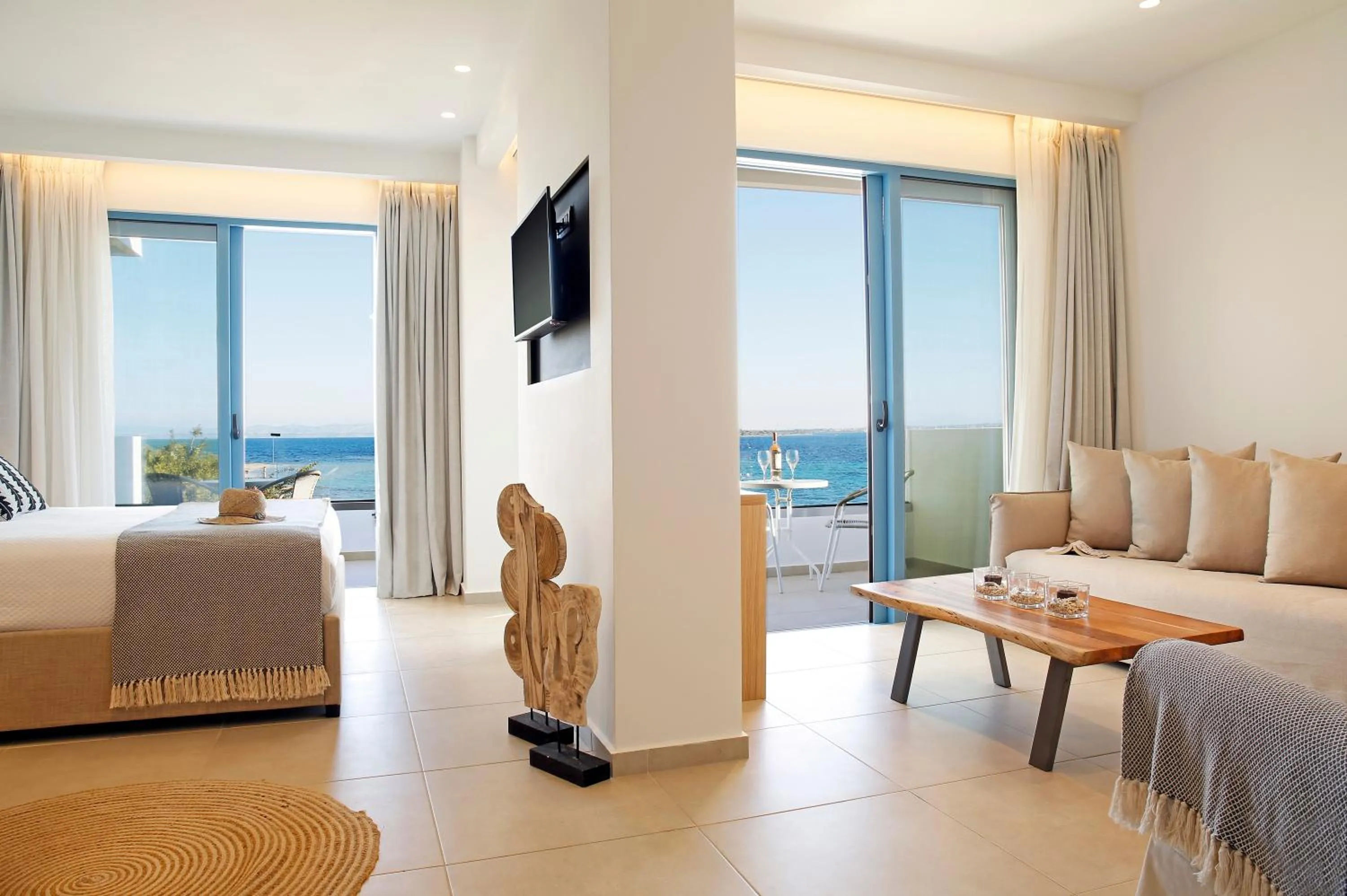 Bed in Oasis Beach Hotel