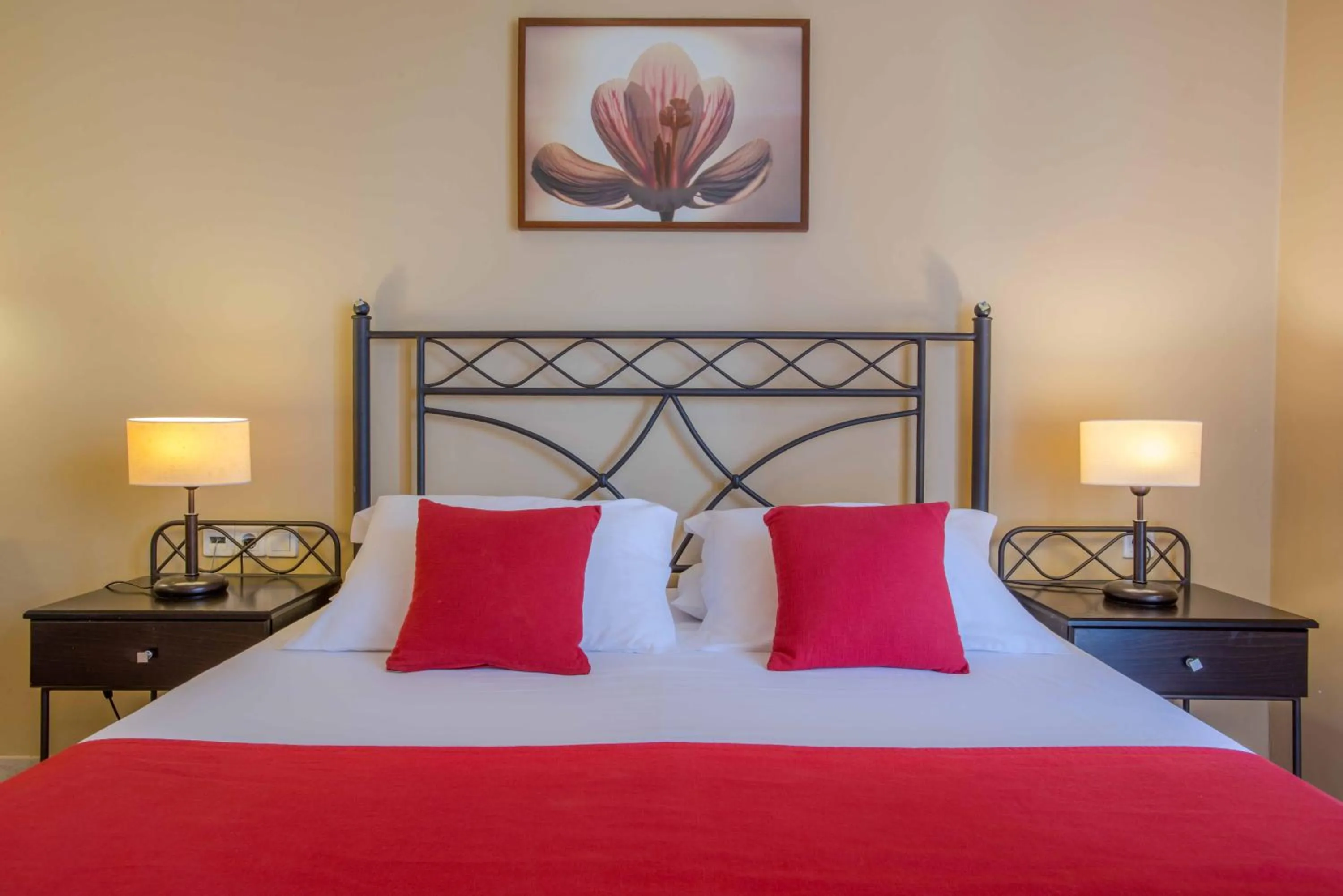 Bed in Oasis Beach Hotel