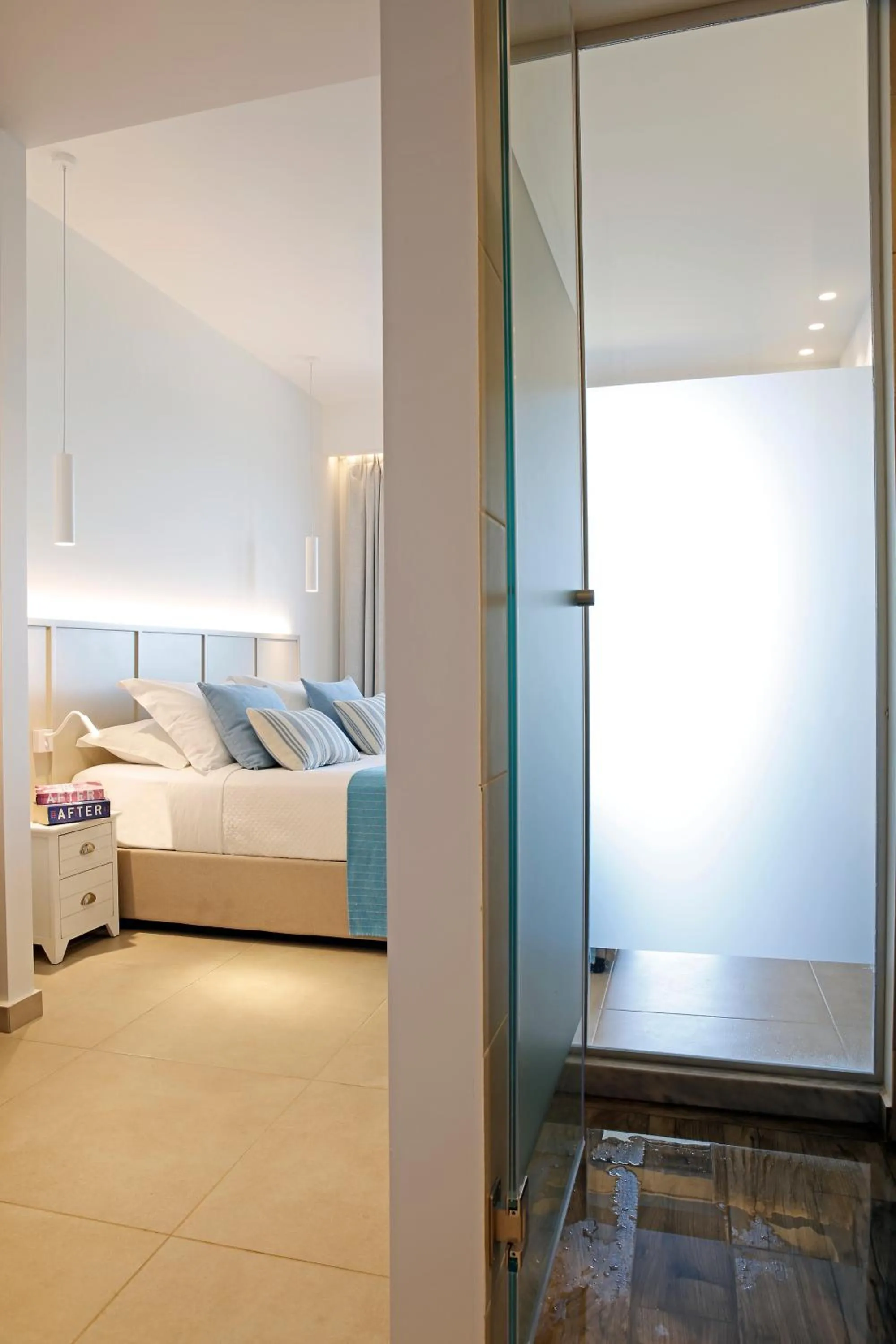 Bed in Oasis Beach Hotel