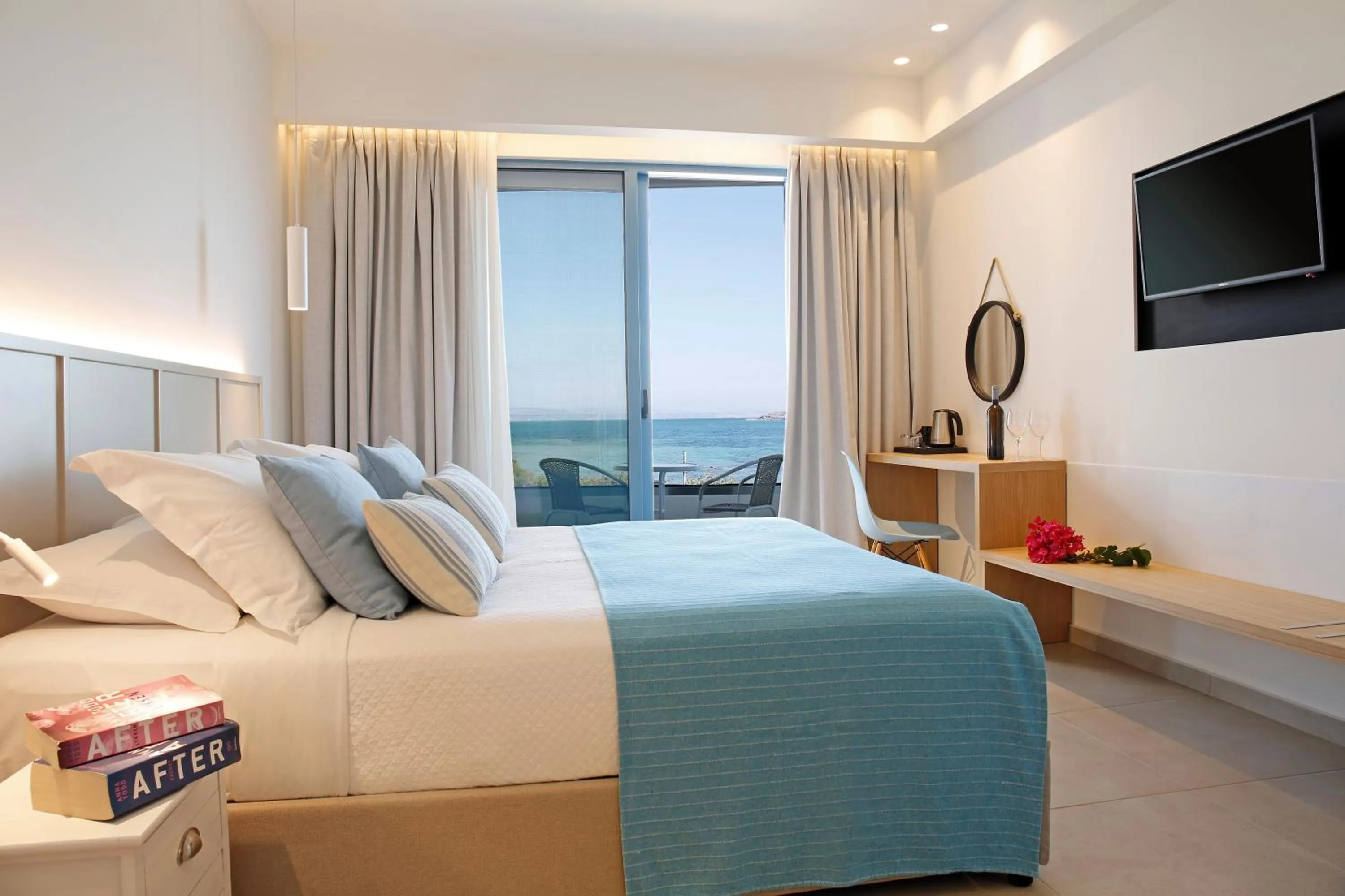 Bed in Oasis Beach Hotel