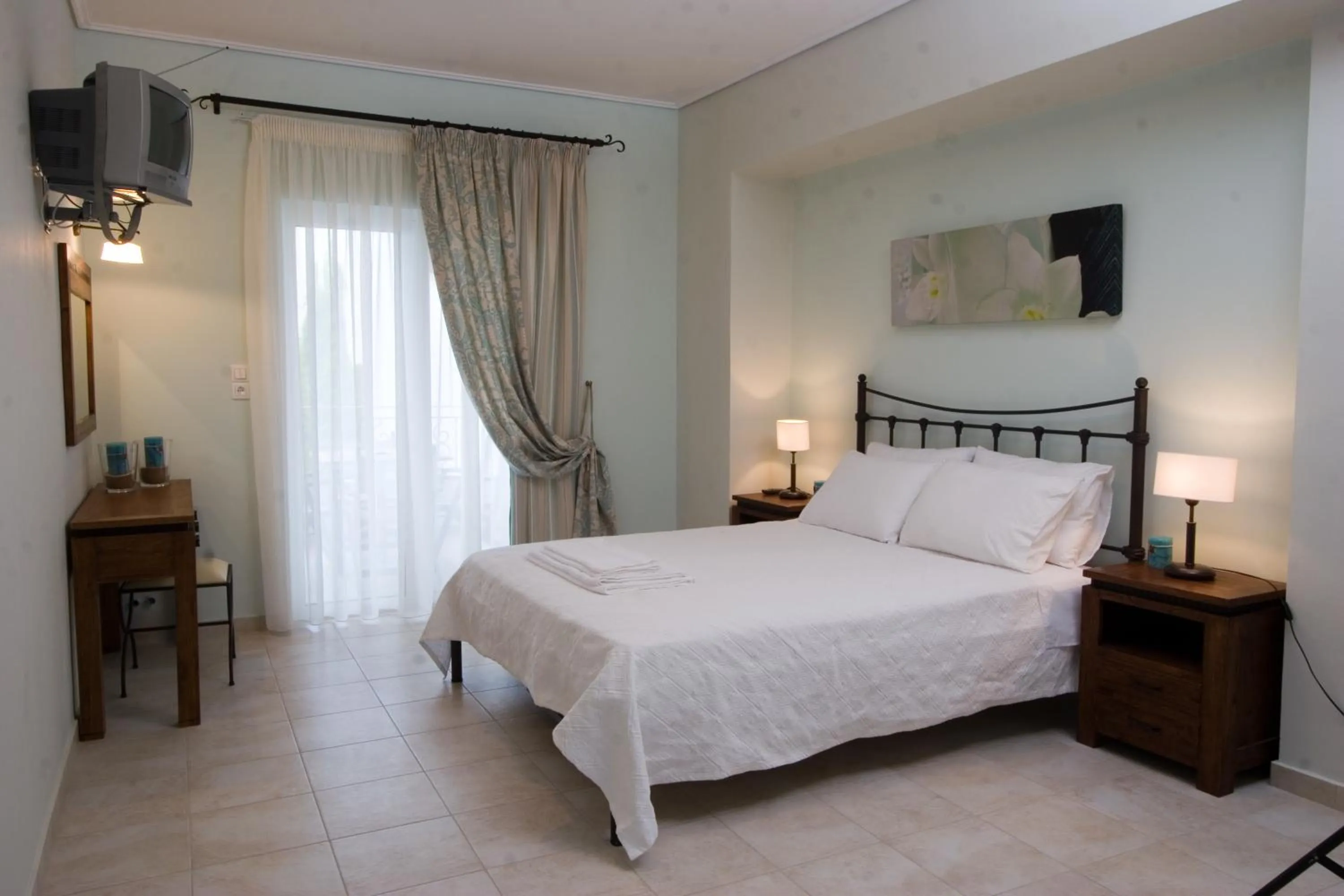 Bed in Oasis Beach Hotel