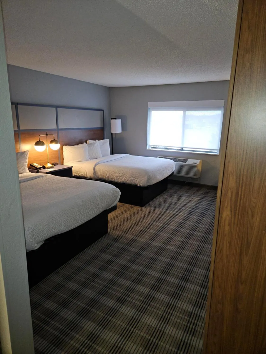 Property building, Bed in AmericInn by Wyndham Mounds View Minneapolis