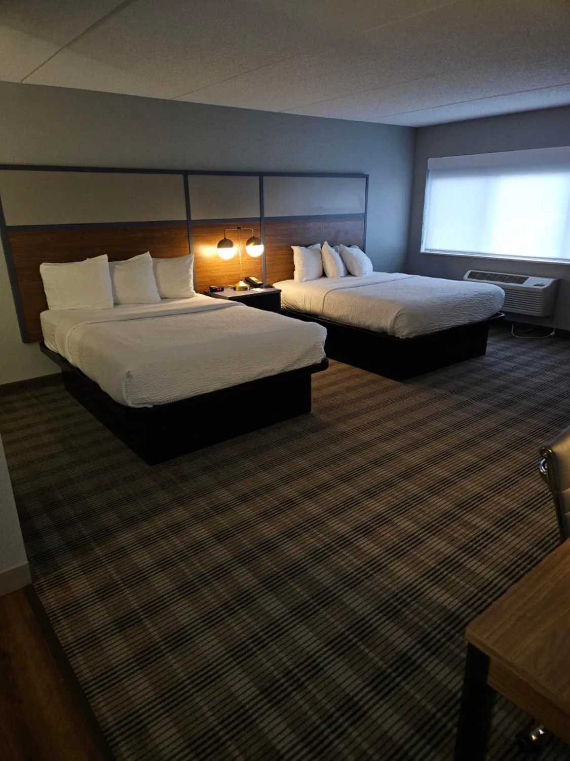 Property building, Bed in AmericInn by Wyndham Mounds View Minneapolis