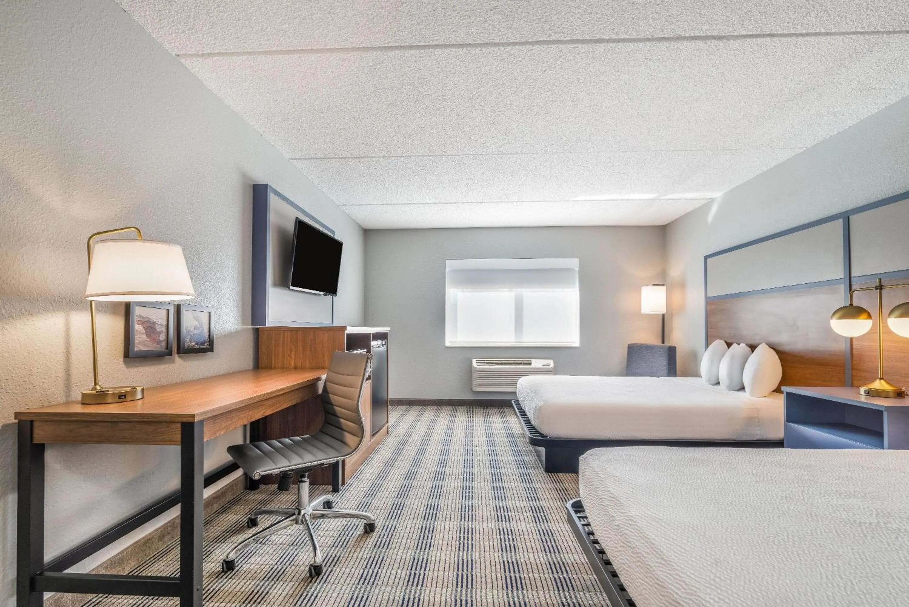 Bed in AmericInn by Wyndham Mounds View Minneapolis
