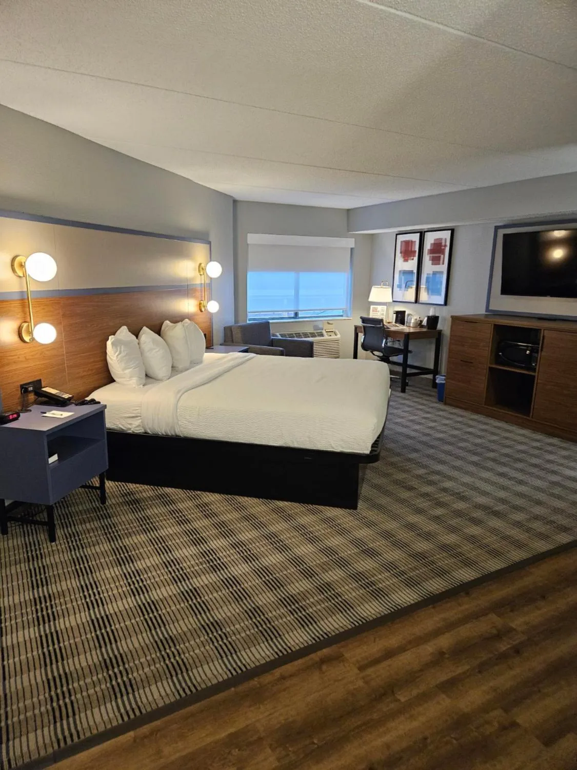Communal lounge/ TV room, Bed in AmericInn by Wyndham Mounds View Minneapolis