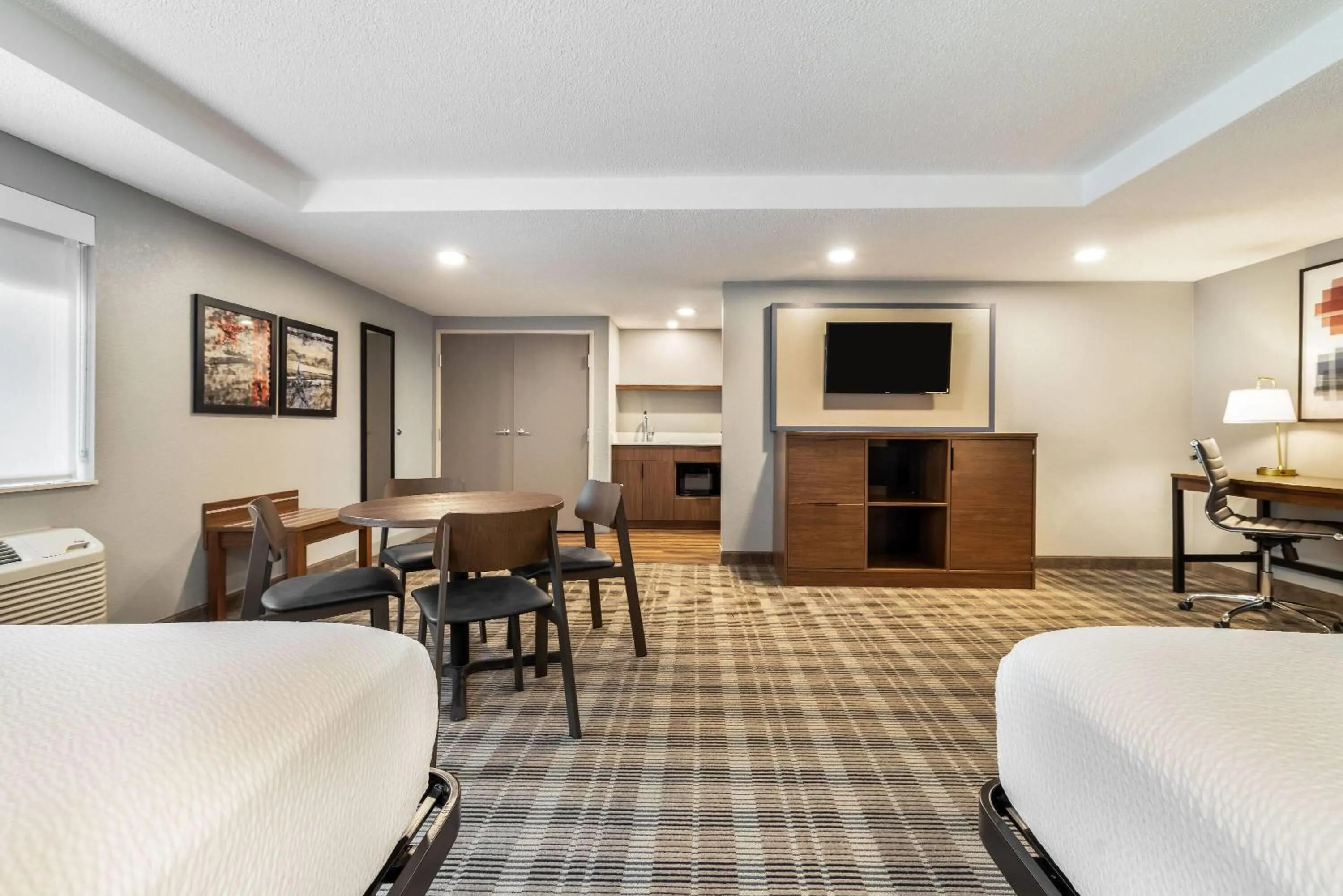 Photo of the whole room, Bed in AmericInn by Wyndham Mounds View Minneapolis