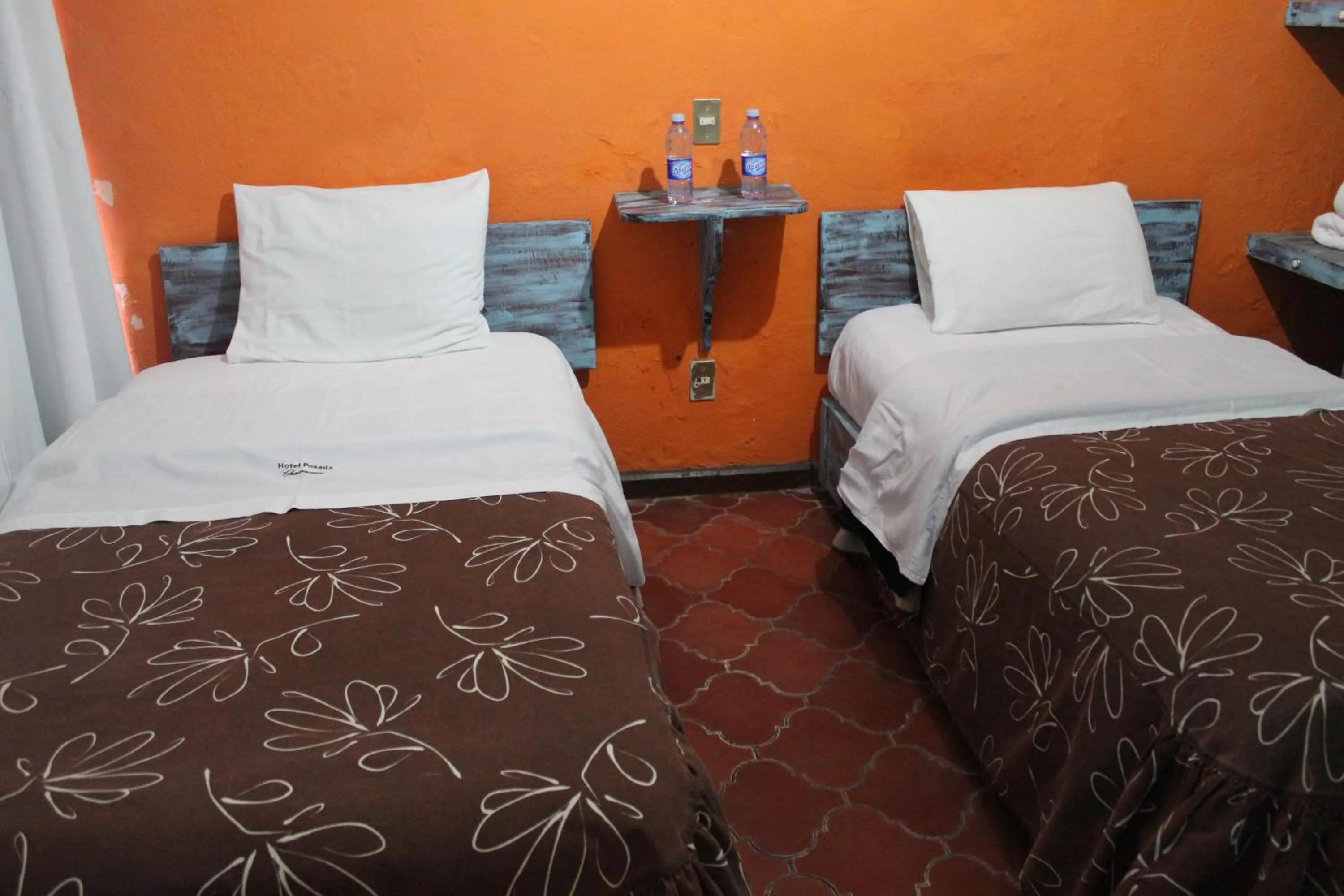 Bed in Hotel Posada Chamacuero