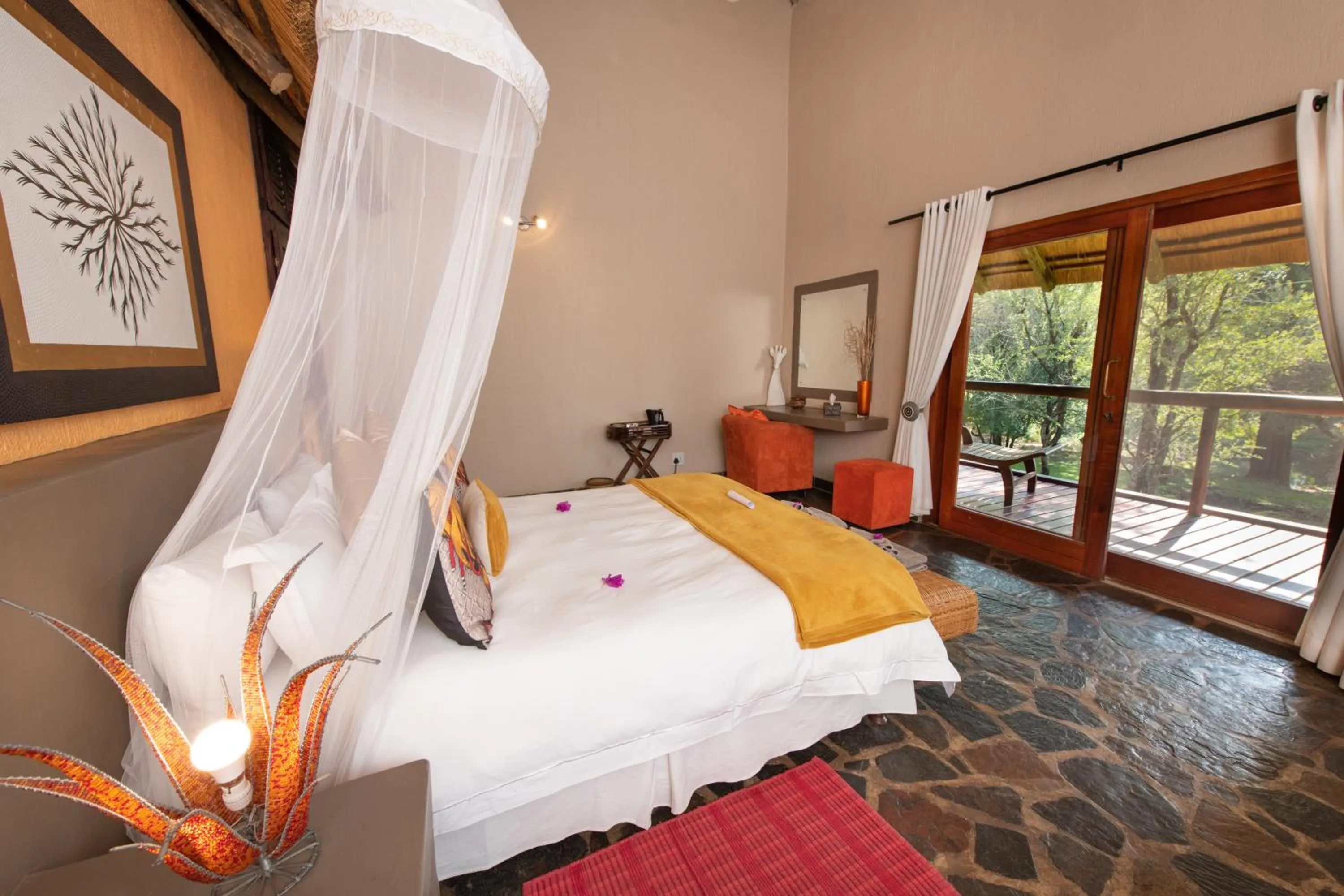 Photo of the whole room, Bed in Blyde River Wilderness Lodge