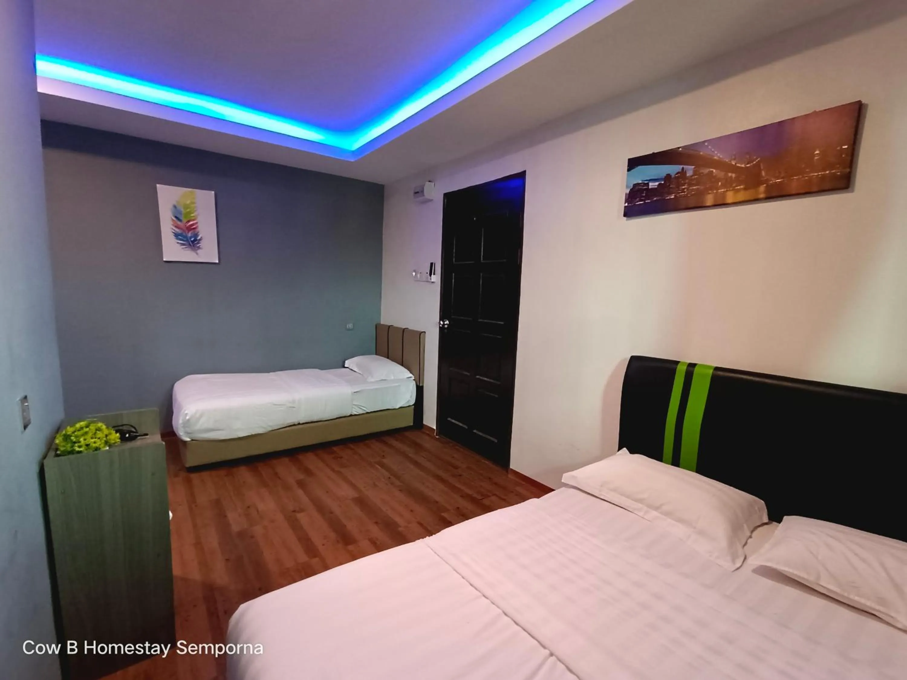 Photo of the whole room, Bed in Cow B Homestay Semporna