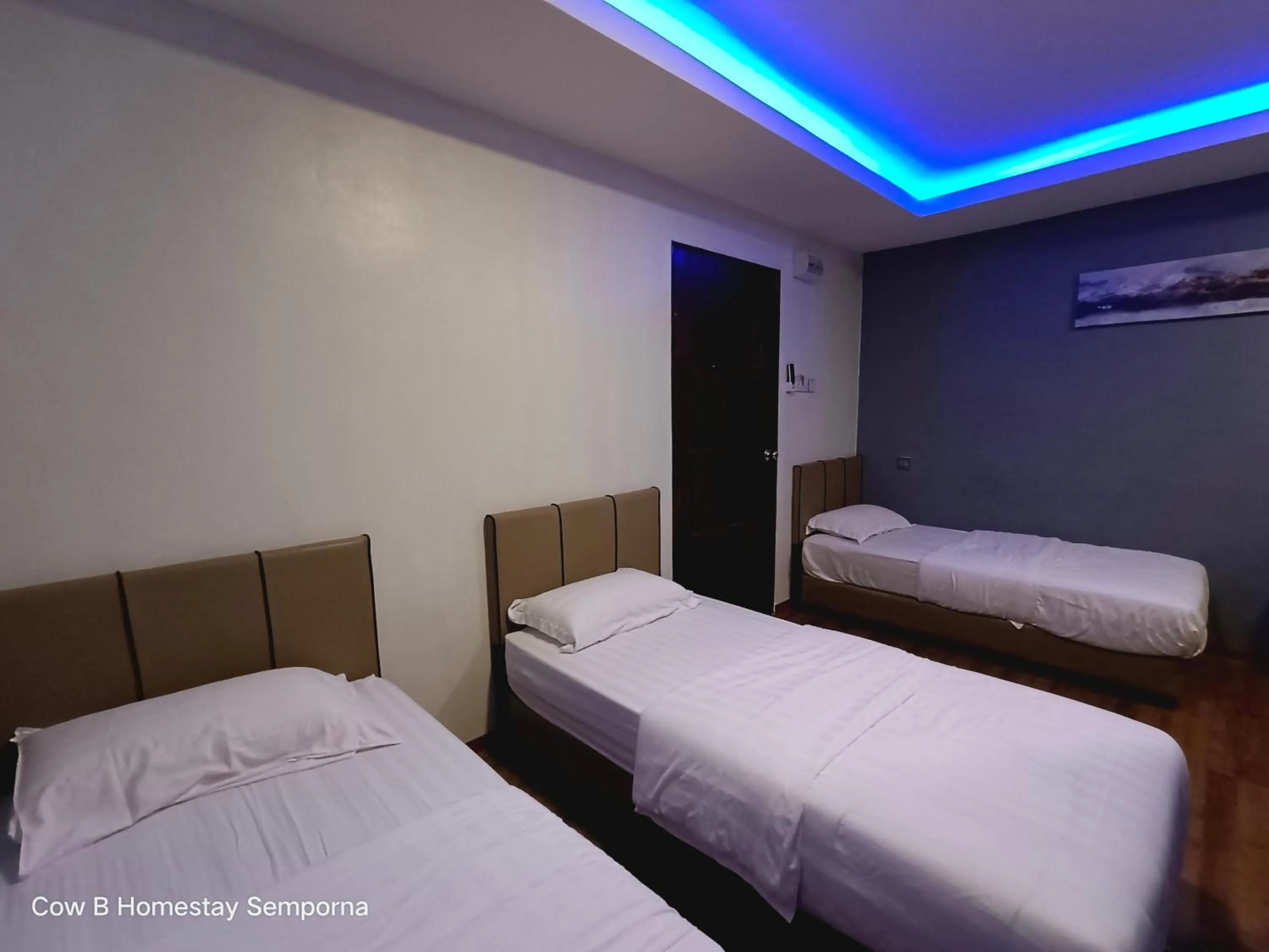 Photo of the whole room, Bed in Cow B Homestay Semporna