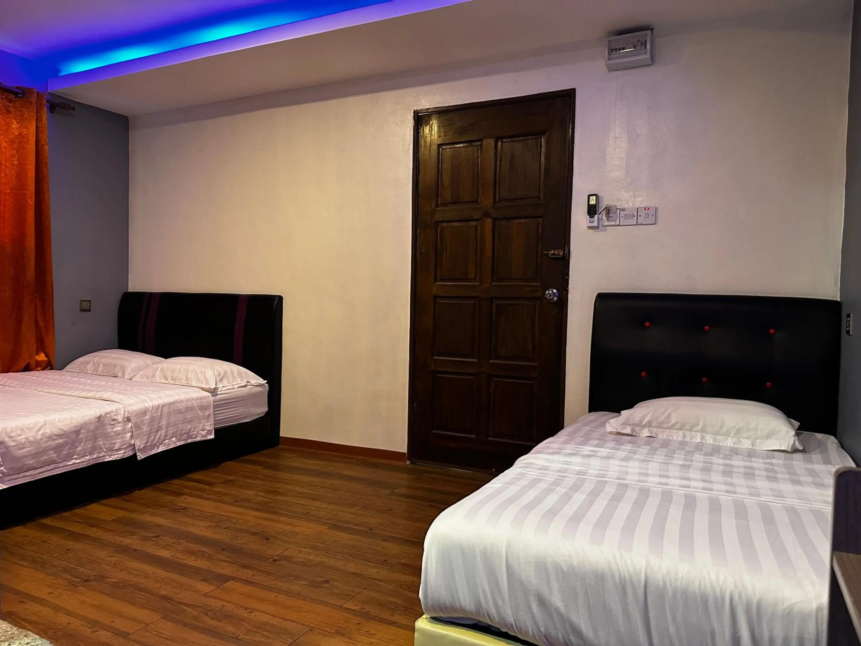 Bed in Cow B Homestay Semporna