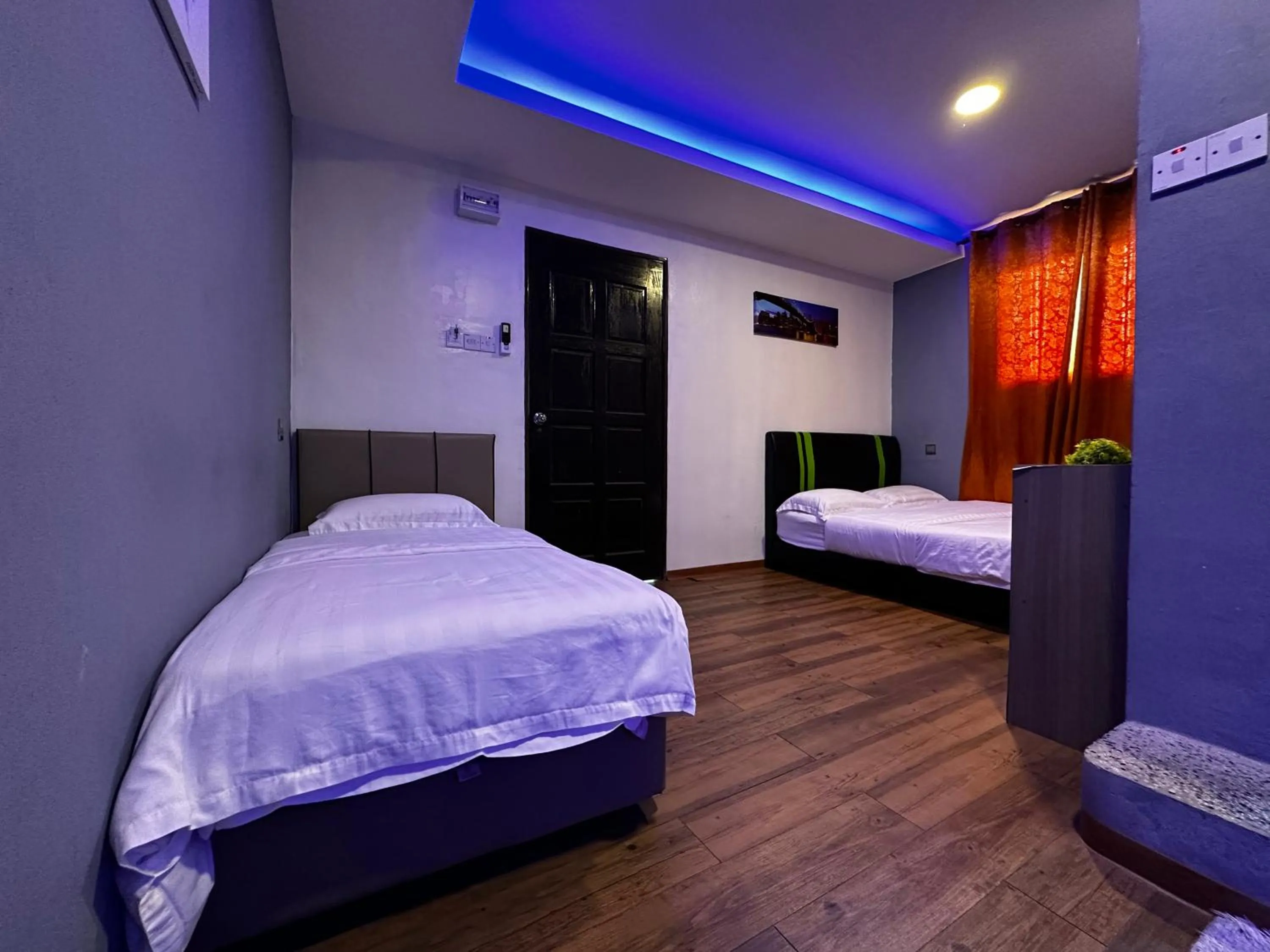 Bed in Cow B Homestay Semporna