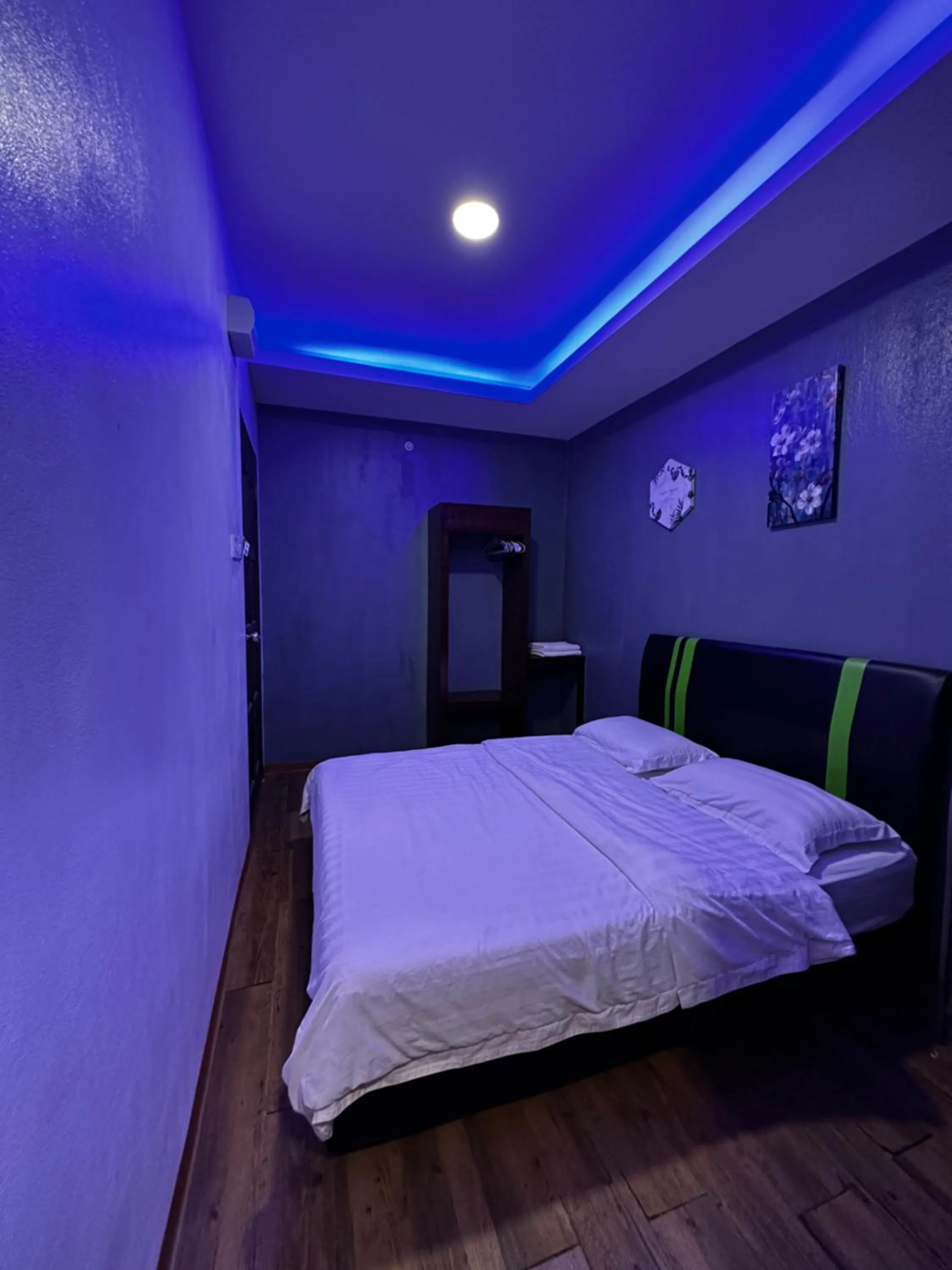 Bed in Cow B Homestay Semporna