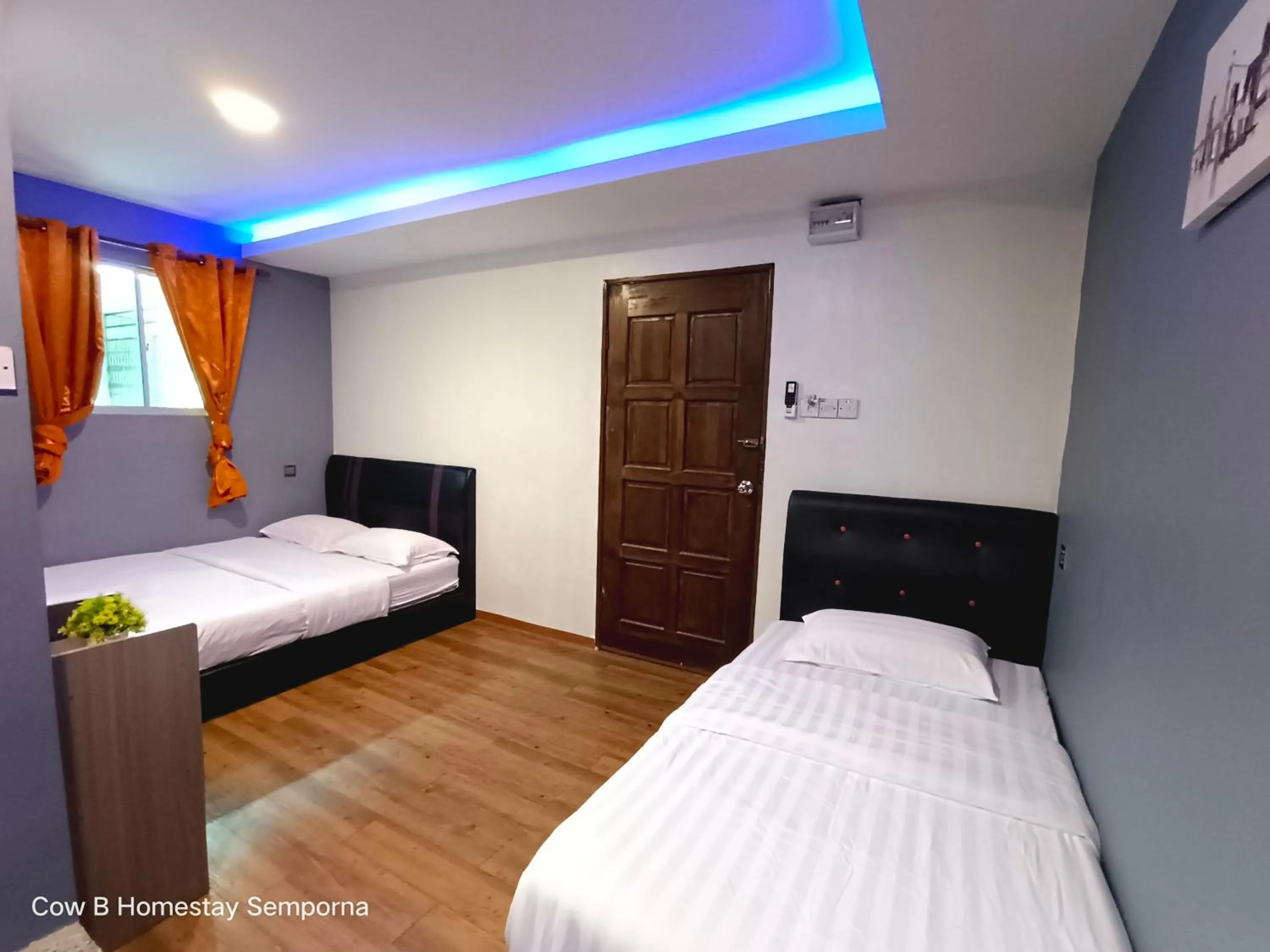 Bed in Cow B Homestay Semporna