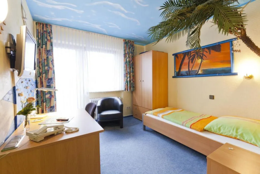 Photo of the whole room, Bed in Themen Hotel Terrassen Cafe