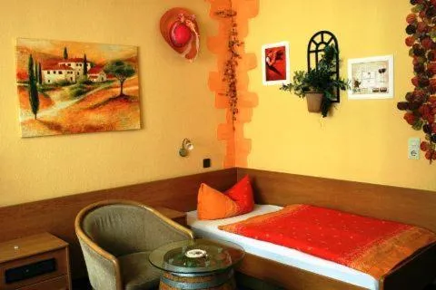 Photo of the whole room, Bed in Themen Hotel Terrassen Cafe