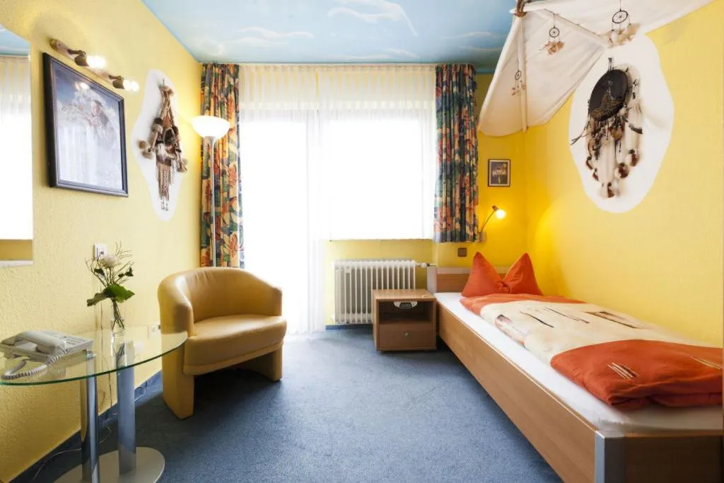 Photo of the whole room, Bed in Themen Hotel Terrassen Cafe