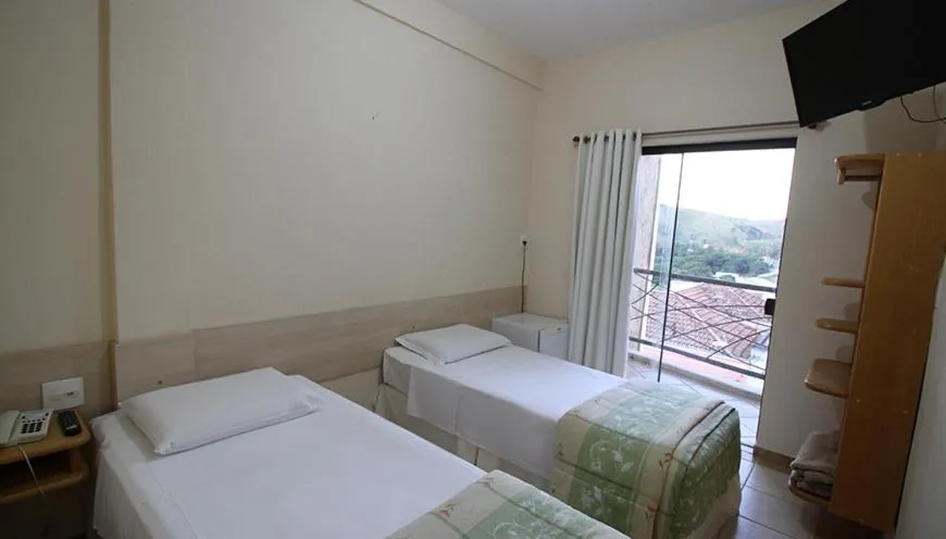 Photo of the whole room, Bed in Marge Hotel